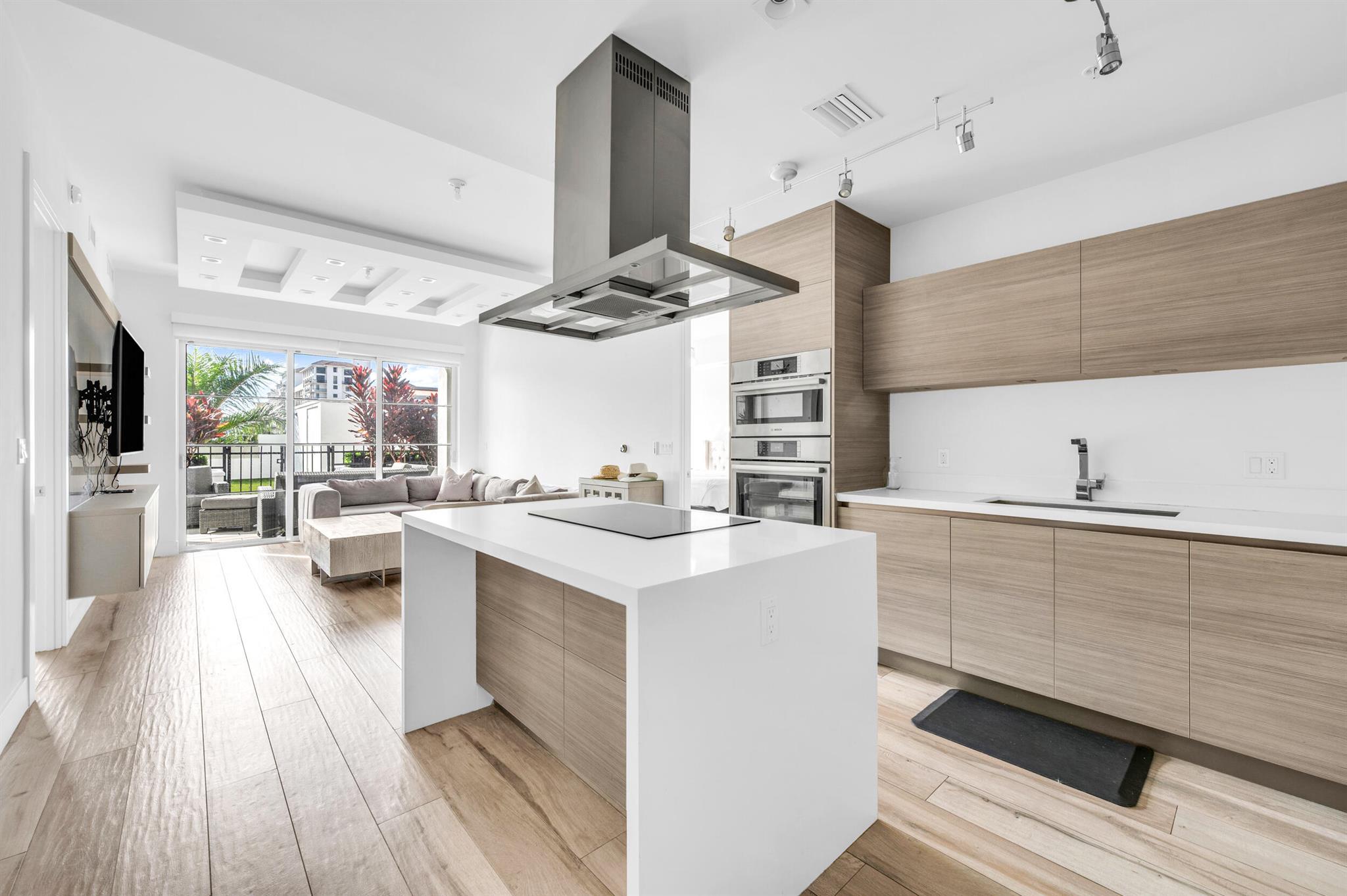 Rarely available South facing 2 bedroom that has been extremely upgraded throughout and with the most amazing private outdoor space.  This unit is light and bright with an abundance of natural light with 10 foot ceiling heights and large sliding glass doors in every room leading to your oversized private outdoor space. Every aspect of this beautiful home has been upgraded and with thoughtful design. Enjoy the convenience of a walk-in closet, soaring 10-foot ceilings, sleek Italian porcelain flooring, high-end custom cabinetry, premium appliances and an open-concept kitchen and living area. Also included are 2 premium parking spaces conveniently located.  All this just 1 block from Mizner Park! Tower 155 is a luxury condo building situated in the heart of downtown Boca Raton, with Mizner Park, shopping, dining, elite golf courses, pristine beaches and The Boca Raton Resort all nearby.

Just like living in a resort or 5 star hotel with every luxury, amenities and services you could imagine. Fantastic walkability and conveniently located in the center of Downtown. Building completely designed by Steven G including the lobby with 24 hour front desk, concierge, valet, resort style pool, hot tub, sundeck overlooking Mizner Park, vibrant bar scene and private cabanas, gym, sauna and steam room, Starbucks business lounge, hairstyling and manicure station and smart building technology. Dine in or take out at Boca's finest restaurants, all within walking distance.