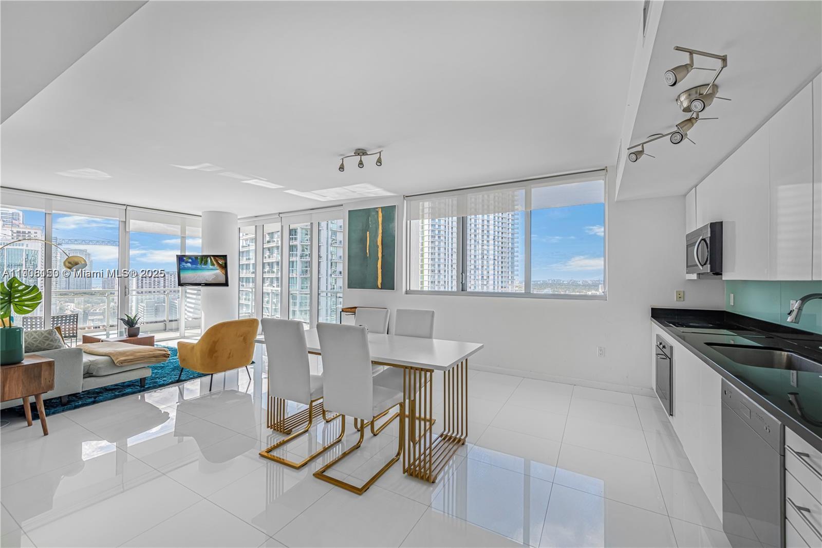 Available 1/1/2026 Experience luxury living in the heart of Brickell with this highly coveted 2/2.5 corner unit at The Mint. Situated within walking distance to top-tier restaurants, nightlife, and Brickell City Centre, this residence offers quick access to highways and the Metro Mover for ultimate convenience. Unit 2405 boasts two bedrooms, two and a half bathrooms, and two spacious terraces overlooking the Miami River. The unit provides breathtaking panoramic views and stunning sunsets. Fully furnished and ready to call home, bring your suitcase. The Mint is a full-service condominium in a secure, gated community. It offers top-tier amenities, including a state-of-the-art gym, wellness spa, pool, Jacuzzi, children's playroom, and billiards.