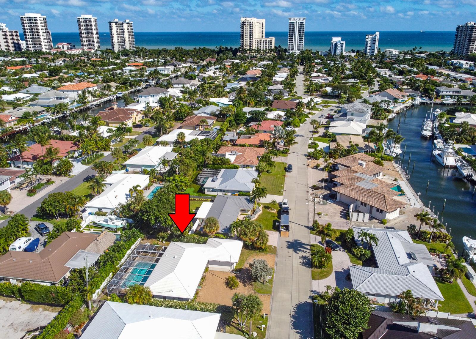 CBS pool home located in the coveted Yacht Harbor Manor subdivision on Singer Island only steps away from the beach. The split floorplan features two bedrooms and two full baths and a spacious living room with sliders that open up to the screened pool area. Plenty of parking with a circular gravel driveway and 2-car attached garage. New A/C in 2022. Take a short walk to the beautiful beach with some of the clearest water in the state or go snorkeling at one of the country's highest-rated shore dive sites at the Blue Heron Bridge. This home needs substantial maintenance and renovation but is ready for your personal touch.