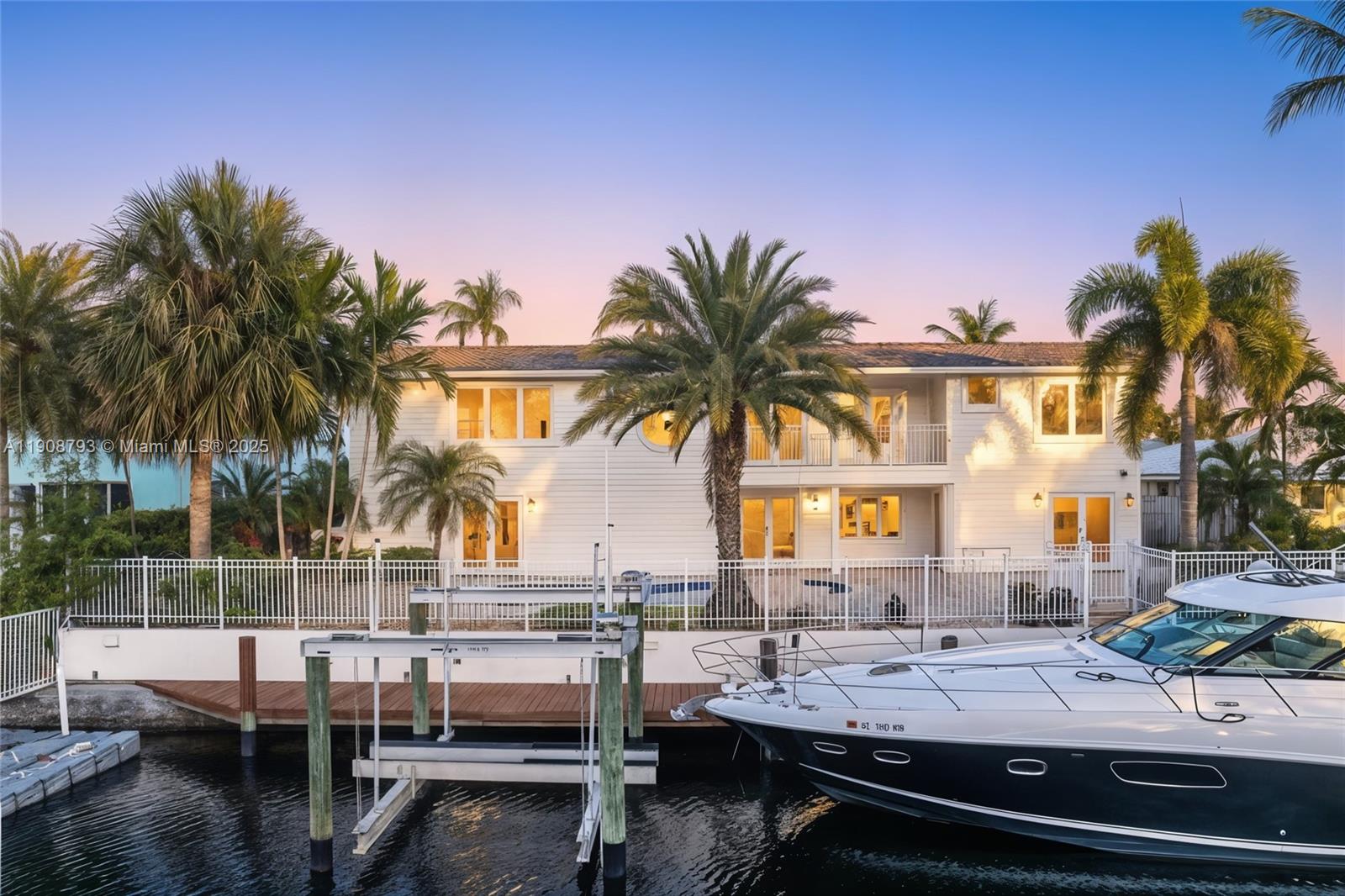 Set along a quiet canal in the sought-after Venetian Isles of Lighthouse Point, this spacious 4,400+ square foot home offers the size and functionality of a new build, at a far more competitive price per square foot, and with the warmth and character of a well-designed family residence. With generous living spaces and a practical layout, it’s ideal for everyday living, entertaining, and extended stays. The main level features open living and dining areas filled with natural light, connecting easily to the kitchen and outdoor spaces. Upstairs, all bedrooms include walk-in closets and are thoughtfully arranged for family comfort. Two bedrooms share a Jack-and-Jill bathroom with separate sinks, while an additional two-bedroom suite offers its own bath and large closet. A central upstairs lounge and west-facing balcony overlook the pool and canal, creating a perfect retreat for relaxation or gathering. For peace of mind, the home is equipped with hurricane impact windows, a backup generator, and 500-gallon underground propane tank. Outdoors, the property is a boater’s dream, featuring a 90-foot dock, boat lift, and quick access to the Hillsboro Inlet and Lake Boca. A rare opportunity to own a canal-front home of this size, layout, and value in one of Lighthouse Point’s most family-friendly communities.