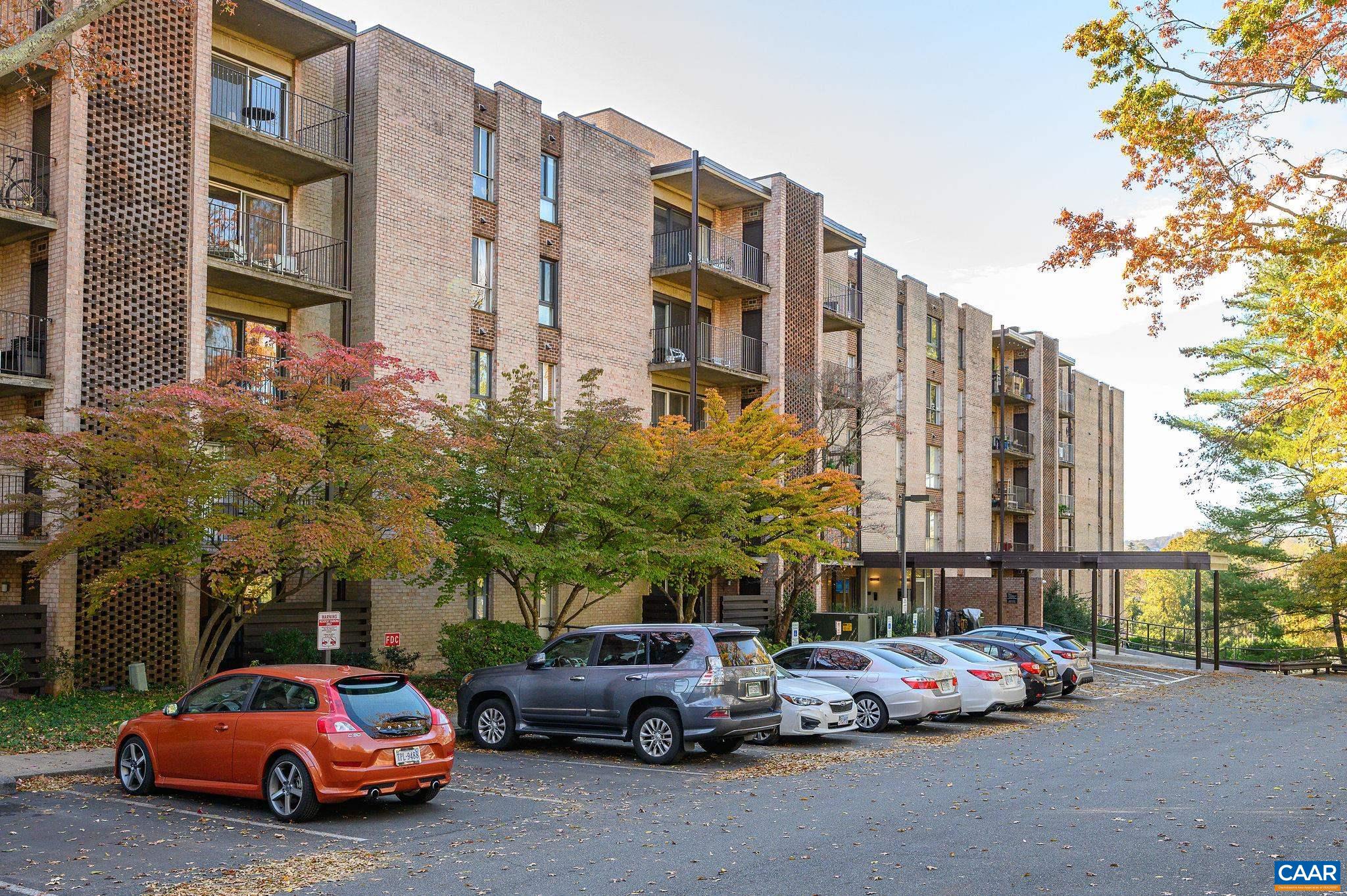 Walk Score of 84/100. Live on a quiet dead end street a short walk from the historic downtown mall with amazing restaurants, venues, shops and more. North facing 1 bedroom condo at Charlottesville Towers. Views through towering trees of the Blue Ridge Mountains. Hardwood floors, gleaming tile bathroom, private balcony, upgraded triple panel sliding glass door and bedroom window. HVAC is approx. 6 years old. Secure entry, onsite laundry, two elevators, ample parking. HOA includes electricity, gas, water/sewer, professional management, area maintenance, master insurance policy, reserve fund, and trash pickup. Additional storage room is available. Over $1.3m in recent capital improvements to building. This condo is move-in ready. Quick close possible.