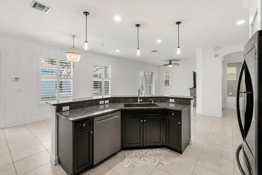 Photo 8 of home located at 115 Leather Leaf Drive, Jupiter FL