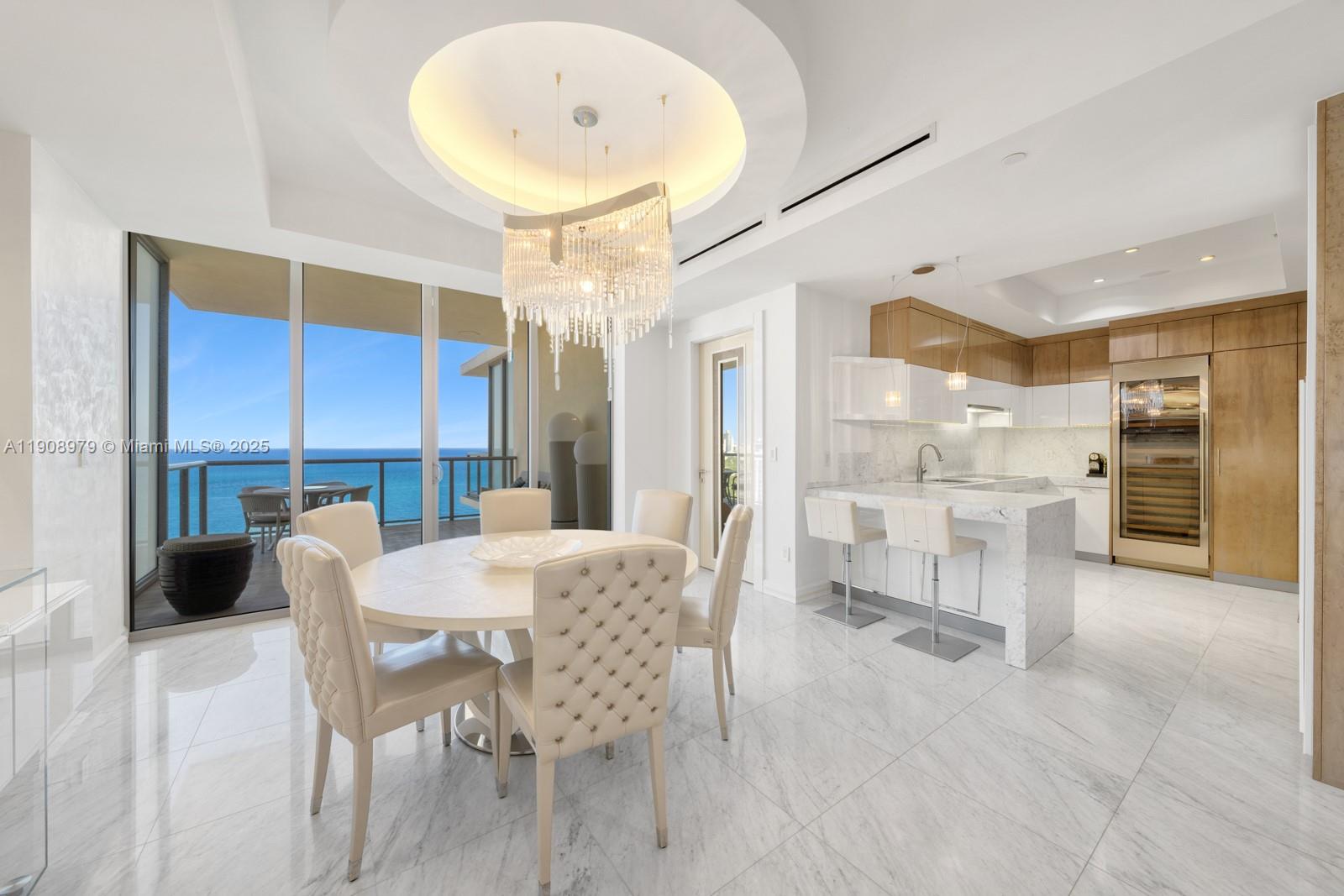 Live above it all at The St. Regis Bal Harbour Resort. Indulge in oceanfront serenity at this world-renowned five-star address. From your private elevator entry, step into an elegant retreat where three terraces reveal uninterrupted ocean views. Penthouse 7 offers 2 bedrooms + den, 2.5 baths, 2,413 sq ft of interiors and 683 sq ft of outdoor living. Features include a chef's kitchen with top-of-the-line appliances, a sun-filled primary suite with spa-inspired bath, large walk-in closets, and smart home technology with Lutron and Control 4. Enjoy St. Regis amenities including butler and concierge service, the Remède Spa, oceanfront dining, beach and pool service, and valet.