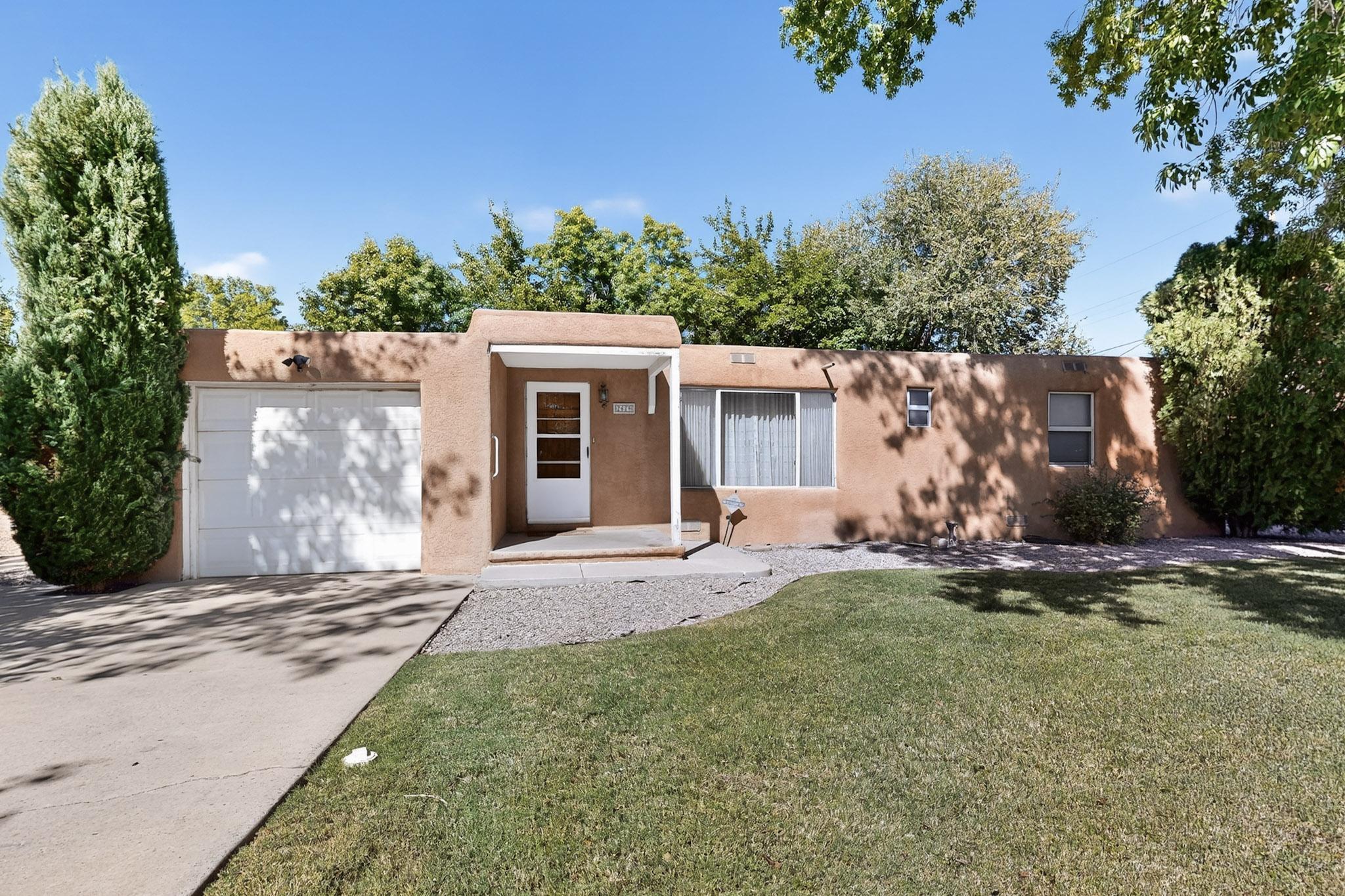An adorable property hidden in a quiet neighborhood close to everything in ABQ. THIS 2 bedroom/ 1.5 bath with 2 living areas, spacious kitchen, large dining room, laundry room, 1 car attached garage is nestled on almost 0.31 acre lot. Enjoy the large yard and landscape as they are very well maintained.