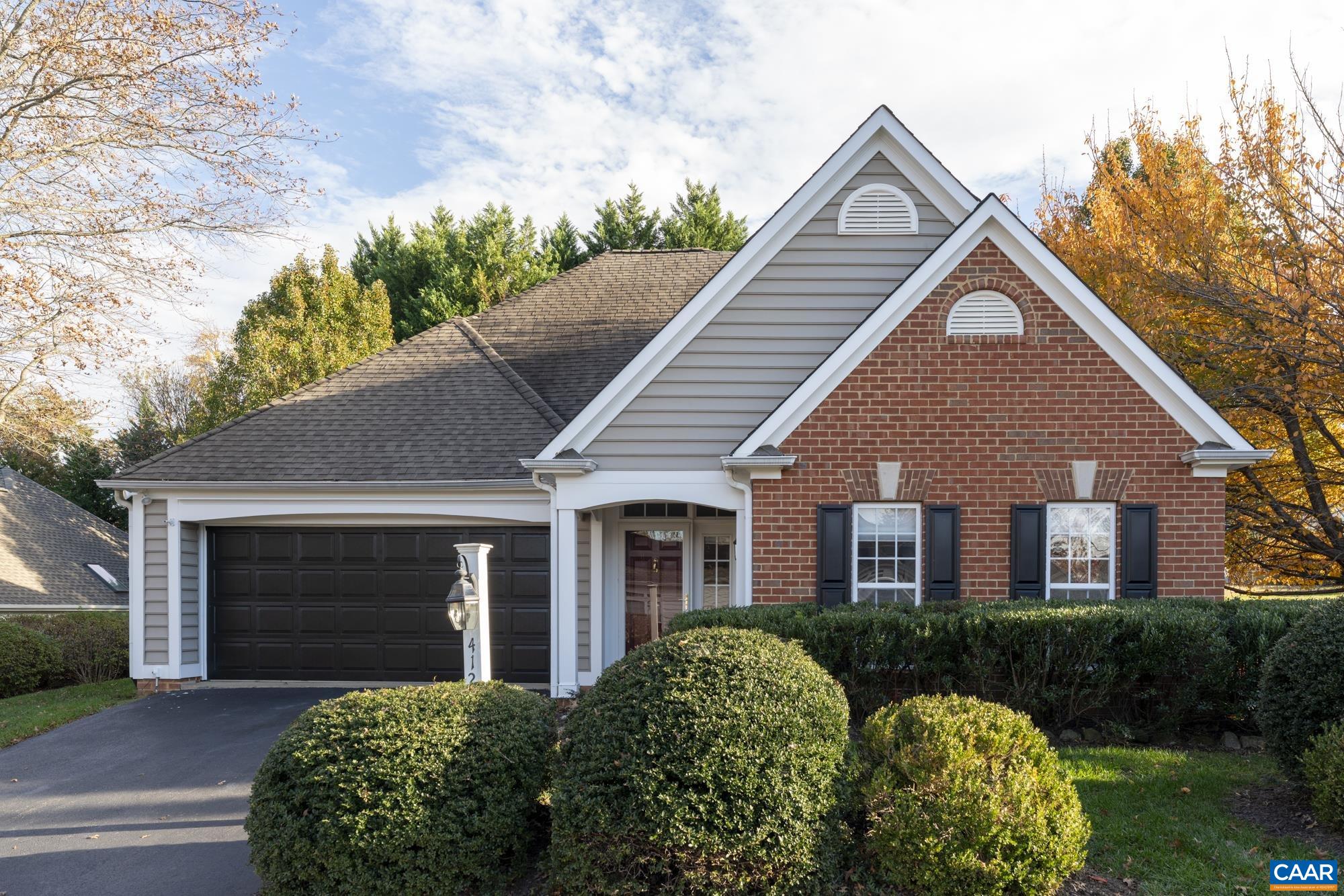 The floor plan you've always wanted.  Large  living room with cathedral ceiling and gas log fireplace, open eat in  kitchen with  granite countertop, pantry and large bar area. All adjoining a spectacular sunroom makes it perfect for entertaining.  Large master suite separated from guest bedrooms.