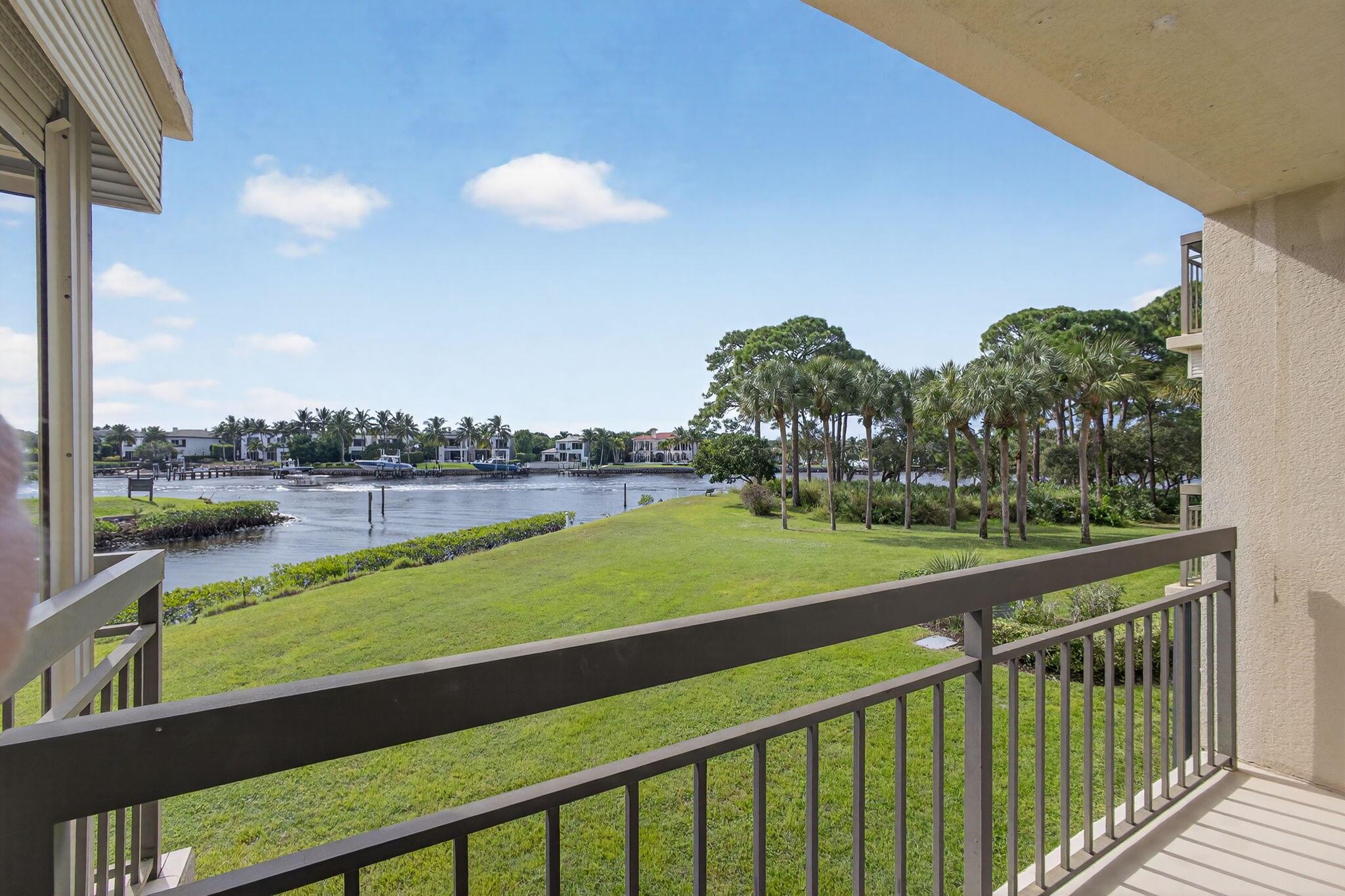Wow! What an amazing view! Rarely available Marina at the Bluffs 2nd floor condo with spectacular, unobstructed Intracoastal views!  One of the best locations in the Bluffs plus great Jupiter location! Wake up each day to gorgeous Intracoastal views without tall trees blocking your views. 2 balconies located off the LR & master BR where you can enjoy the boats going by & fantastic sunsets. Community has a private marina, tennis courts & pools, with a pool adjacent to building 2201. Some updates, including A/C 2020, Water heater 2020, DW 2022, Dryer 2023, Washer 2024, Master BR shutters 2022 & kitchen remodel 2014. Bonus room off laundry room.  Close to beaches, parks, Juno Pier, restaurants & shopping.  Don't miss out!!