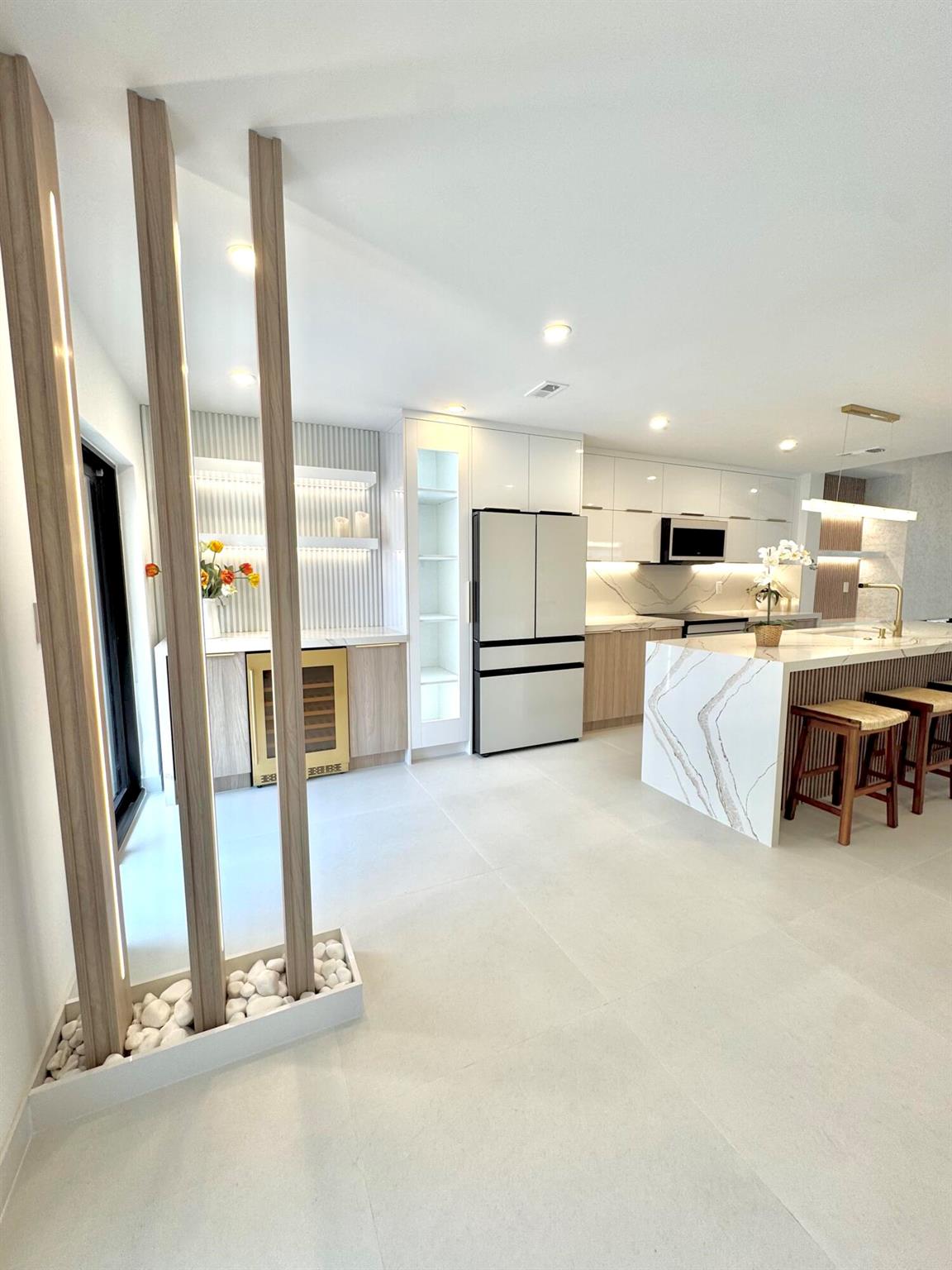 This 3-bedroom, 2-bath townhome offers modern living in one of Boca Raton's most desirable neighborhoods. The property features a spacious one-car garage, a fully remodeled interior, and brand-new appliances throughout.Enjoy peace of mind with all impact windows and doors, plus a low HOA fee that includes access to premium amenities such as a community pool, tennis courts, and clubhouse.Step outside to a gorgeous private backyard--beautifully landscaped and illuminated at night, perfect for relaxing or entertaining. The location couldn't be better -- you're just a short walk from top-rated restaurants, shops, and A-rated schools.