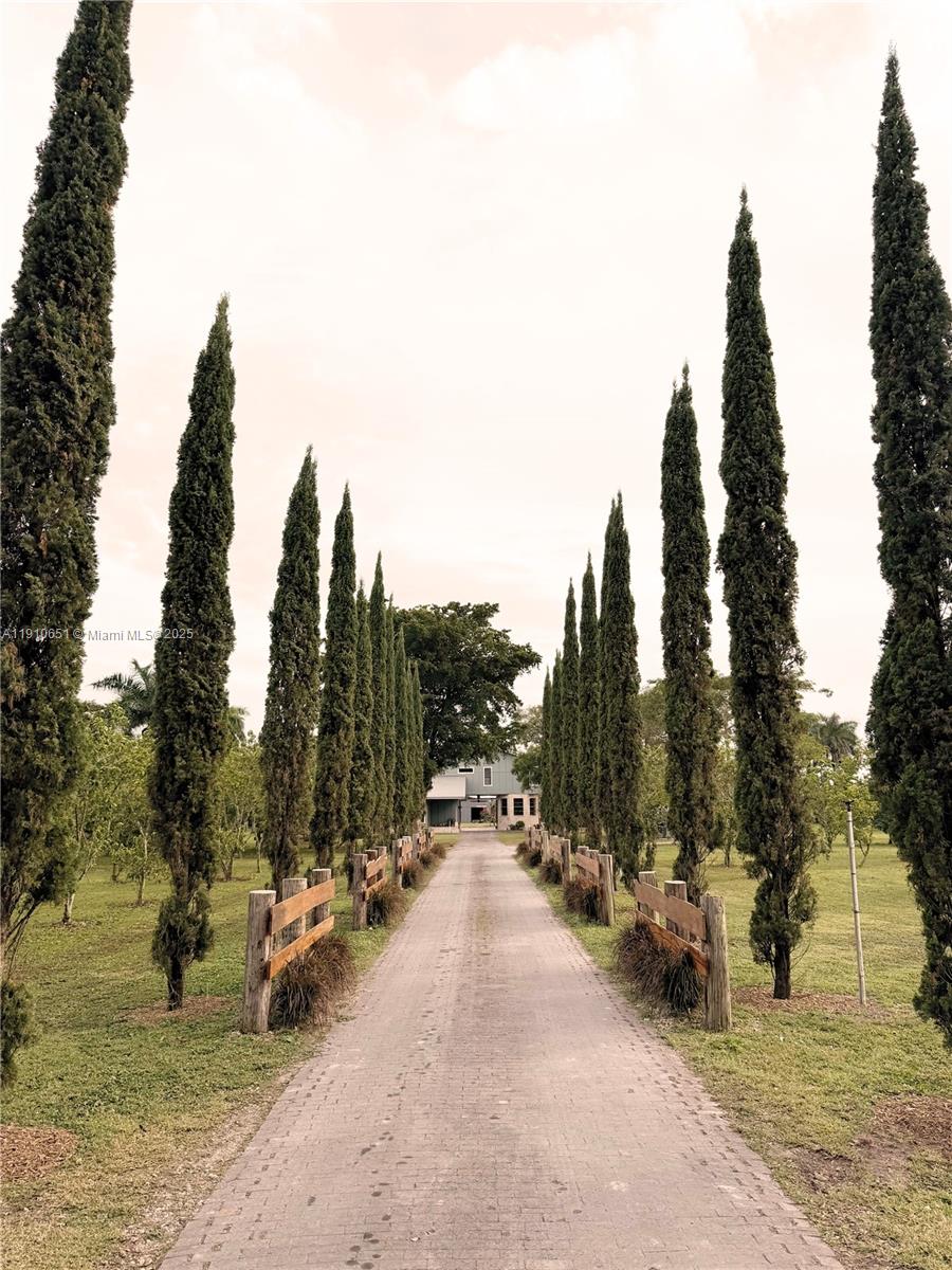 Unique Profitable Property in Redlands.Discover a truly unique property where living & creating a business can come together with high economic potential, ideal for Airbnb,professional workshops or retreats,farming, organize events etc. Has large gazebo with kitchen & bbq, & 2 additional bathrooms. Children’s playhouse, lush gardens, income-producing fruit trees, RV space. Enjoy a large fish pond with a waterfall, designed for relaxation & positive energy, & horse stable. Versatile multiple additional multi-use buildings. Has independent generator connected to electric panel. Most corners are designed for comfort, autonomy, & multiple income opportunities. More than just a home, this property is a lifestyle & business concept, a place where creativity, fun, & profitability come together...