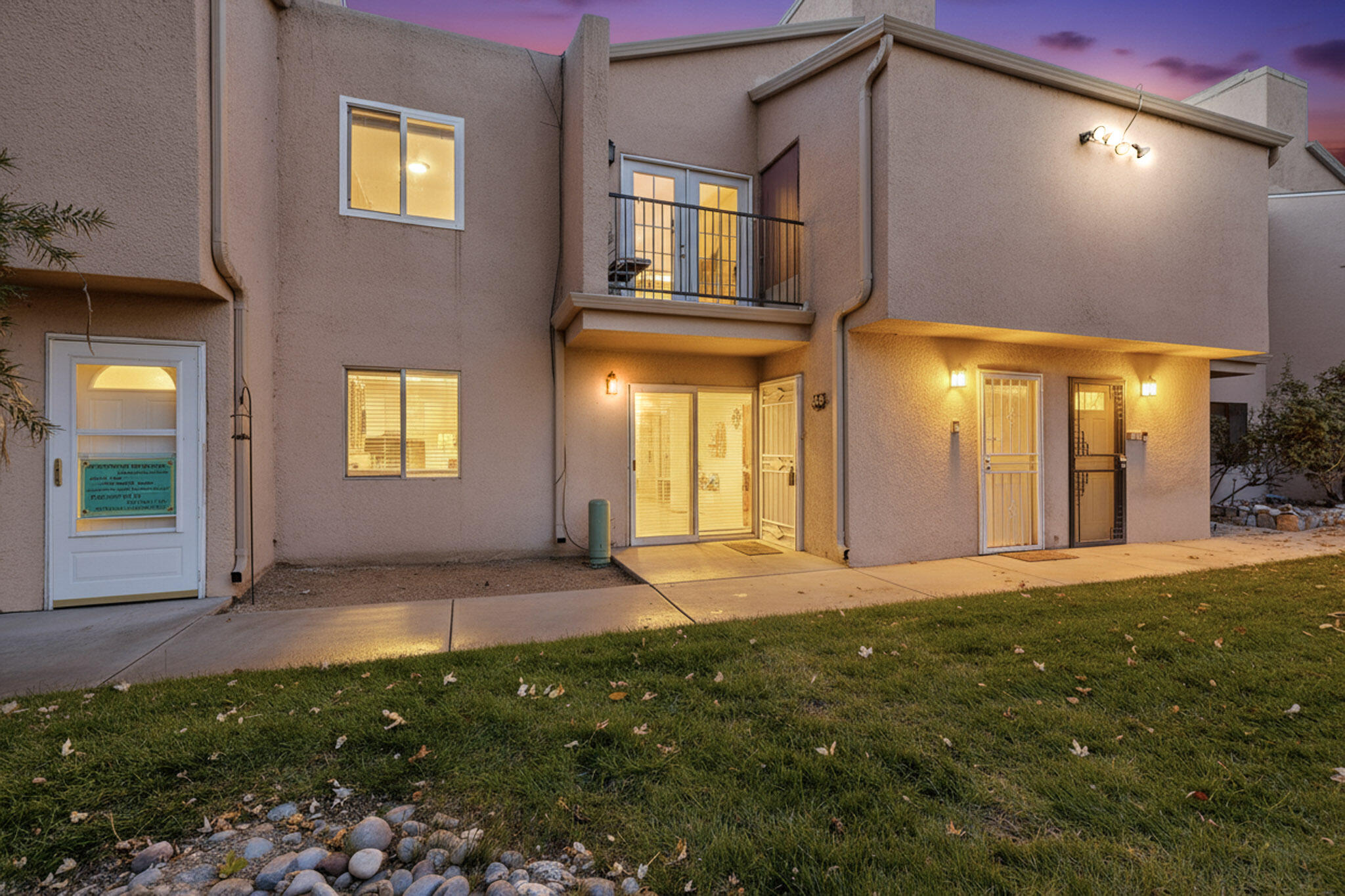 Welcome to this charming 2-bedroom, 2-bathroom condo located in the heart of the Northeast Heights. The flowing layout offers plenty of natural light, while the living and dining areas create a warm and welcoming atmosphere with freshly textured and painted ceilings. This inviting home has newly installed refrigerated air for year-round comfort. Enjoy the convenience of being just steps away from the community pool--perfect for relaxing or entertaining on sunny New Mexico days. Sandia Plaza offers outstanding amenities, including a clubhouse, community pool, laundry facility, reserved covered parking & meticulously landscaped grounds. With water, sewer, trash, exterior, and common area maintenance included in the HOA, you'll enjoy peace of mind & low-maintenance living. Come take a tour.