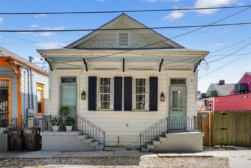 Live the Bayou St. John lifestyle in this beautifully updated 3-bedroom, 2-bath home that blends comfort, charm, and functionality. Just reduced to $399,000.  Nestled in one of New Orleans' most beloved neighborhoods, this home offers easy access to parks, the bayou, dining, and festivals—just steps from all the action. Inside, the spacious living room welcomes you with soaring ceilings, abundant natural light, and an open feel that makes entertaining effortless. The updated kitchen features stunning quartz countertops, stainless steel appliances, custom cabinetry, and a convenient layout great for daily living or hosting gatherings.All three bedrooms are generously sized with hardwood flooring and ample closet space, making them great for guests or a home office setup. Both bathrooms are thoughtfully designed with plenty of counter space and storage—combining practicality with style.
Step outside to enjoy the outdoors year-round