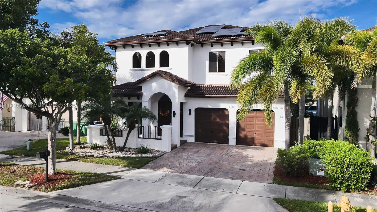 Welcome to this stunning 4/3 two-story Salted System Pool home in the Peaceful and well-kept community of  Enclave at Black Point Marina! Featuring vaulted ceilings, an open kitchen with newer SS appliances, newer W/D, and abundant natural light throughout. One bedroom and full bath on 1st floor offer the perfect in-law suite. Upstairs, the spacious primary suite boasts double doors, a seating area, & 2 walk-in closets. The other 2-BR upstairs also features walk-in closets. 2 AC (1 Newer). Having a private salt-system pool with/Spa & biking to Black Point Marina Path is what outdoor enjoyment in Miami is all about. One of the lowest HOAs in Miami $67 covers lush green areas and front lawn maintenance. Bring your pickiest buyer, it won't disappoint.