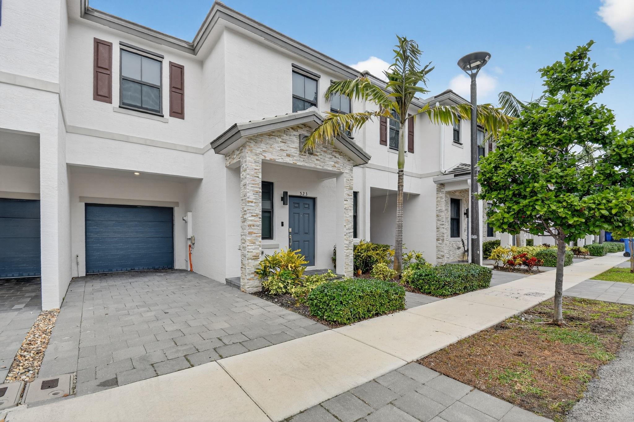 Welcome home to this modern three bedroom two full and one half bathroom townhouse in the gated community of The Edge on 20th! Built in 2021/22 and spanning 1,328 sq ft, this bright, two-story gem features an open stainless-steel kitchen, upstairs laundry, a private fenced backyard, a one-car garage (plus extra paved parking), and easy access to downtown Fort Lauderdale, Las Olas & the beach. Move in and start living the beach-city lifestyle. Perfect for primary residence or investors!