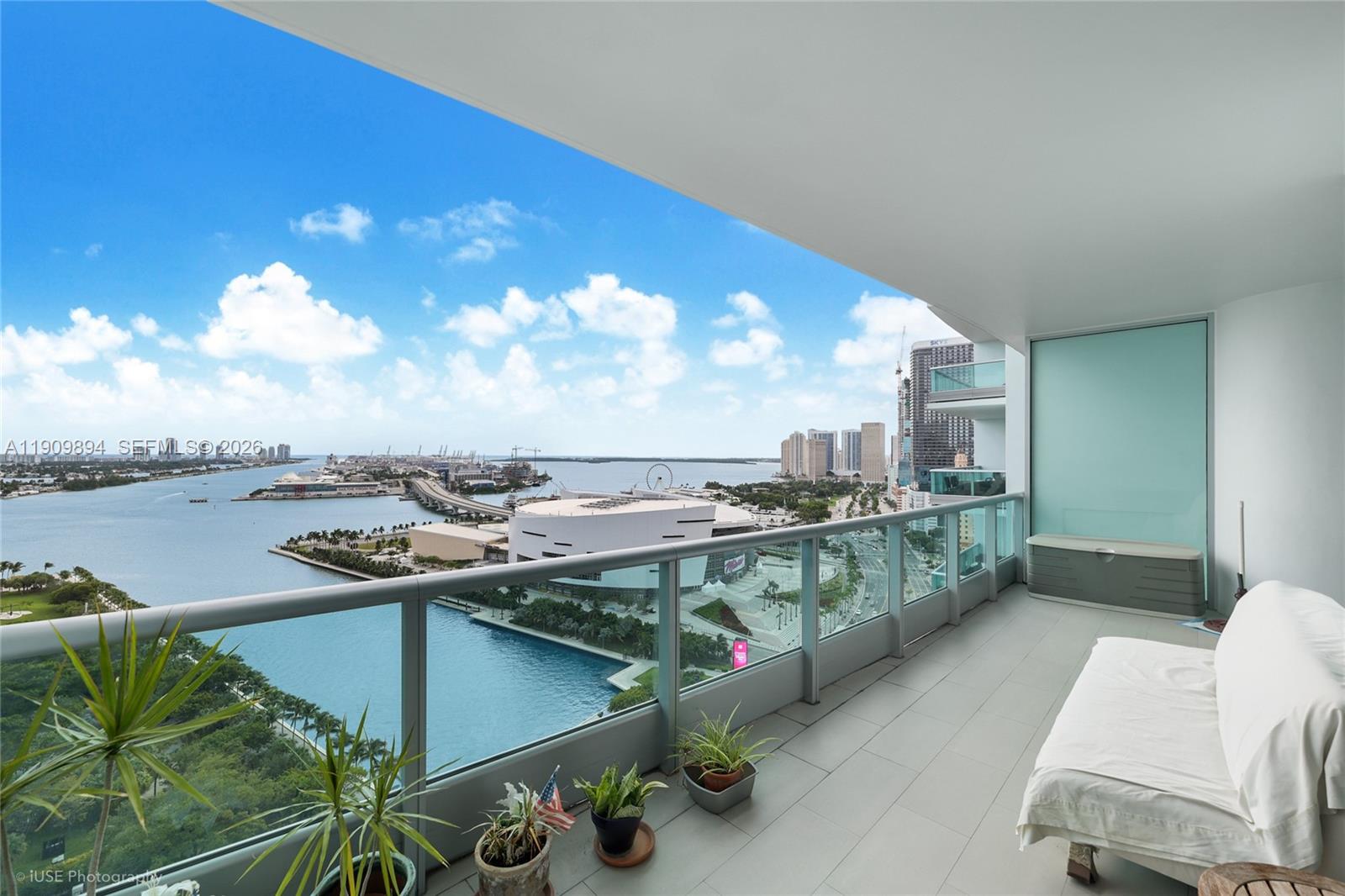 Luxury living in one of Miami's most desirable locations! This stunning 2-bedroom + den, 3 full bathrooms CORNER UNIT can easily be converted into a 3-bedroom apartment. One parking & additional valet options. Breathtaking water and skylines views of Biscayne Bay (will never be obstructed), on high 26th fl. Private elevator w/an exclusive foyer & panoramic views from every room. Steps from Miami Heat Arena, Bayside Marketplace, Arsht Center for the Performing Arts. Minutes from Brickell, Wynwood, Design District, South Beach, and Miami Airport. Amazing amenities: World-class spa, state-of-the-art fitness center, private cinema, 2 pools, 24-hr concierge & security. Seller Financing/Owner Financing Available (25% down, 4.99% interest, 30 year amortization, 3 year balloon, monthly principal and interest).