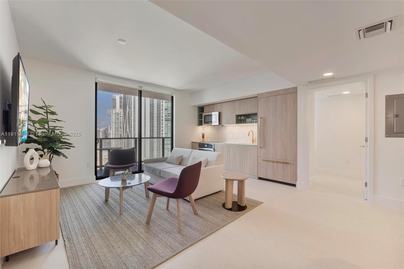 **Turnkey Luxury Investment – Fully Furnished 2BD/2BA with Partial Bay Views**Discover the perfect blend of luxury, convenience, and investment potential in this high-floor 2-bedroom, 2-bathroom apartment with partial views of Biscayne Bay. Fully furnished with high-end finishes, this unit is enrolled in a rental program, offering steady income for the rest of the year—a prime opportunity for investors. Key features include a stylish layout, and exceptional amenities: pool, gym, spa, restaurants, event hall, kids’ playroom, and more. Located just steps from FX Stadium, top dining, and shopping, and surrounded by iconic venues like Miami World Center, Frost Museum of Science, Miami Airlines Arena, and the Adrienne Arsht Center for Performing Arts. Virtual tour available!!!