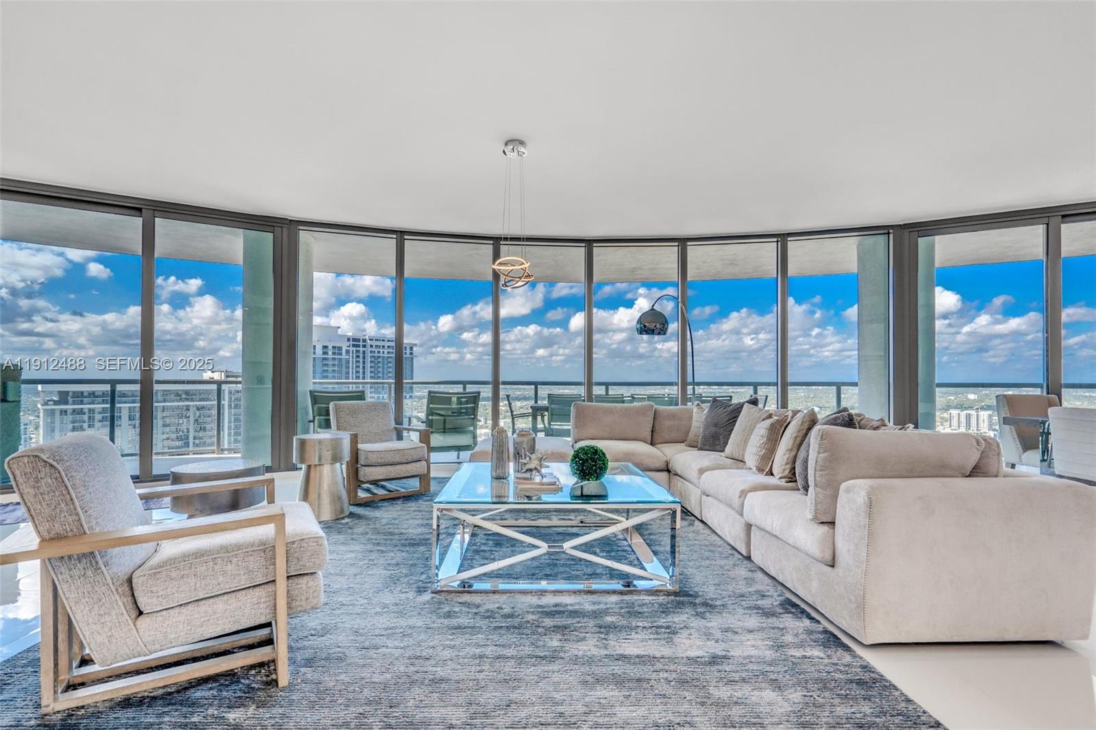 Furnished, designer-finished & move-in ready! Rising above Fort Lauderdale skyline, Residence 3703 at prestigious 100 Las Olas offers luxurious indoor/outdoor living with panoramic views of the river, skyline, park& ocean. This open-concept home features 3 en-suite bedrooms +den, wet bar, motorized shades, European Nolte cabinetry, quartz countertops & Jenn-Air appliances. The primary suite impresses with floor-to-ceiling glass, spa-inspired bathroom with dual vanities, soaking tub & walk-in shower, plus two custom walk-in closets. Two spacious terraces create a seamless indoor-outdoor flow for entertaining or relaxing. Enjoy resort-style amenities including valet, concierge, gym, rooftop pool, cabanas, grills & lounges—all in the heart of Las Olas near fine dining, shops & entertainment.