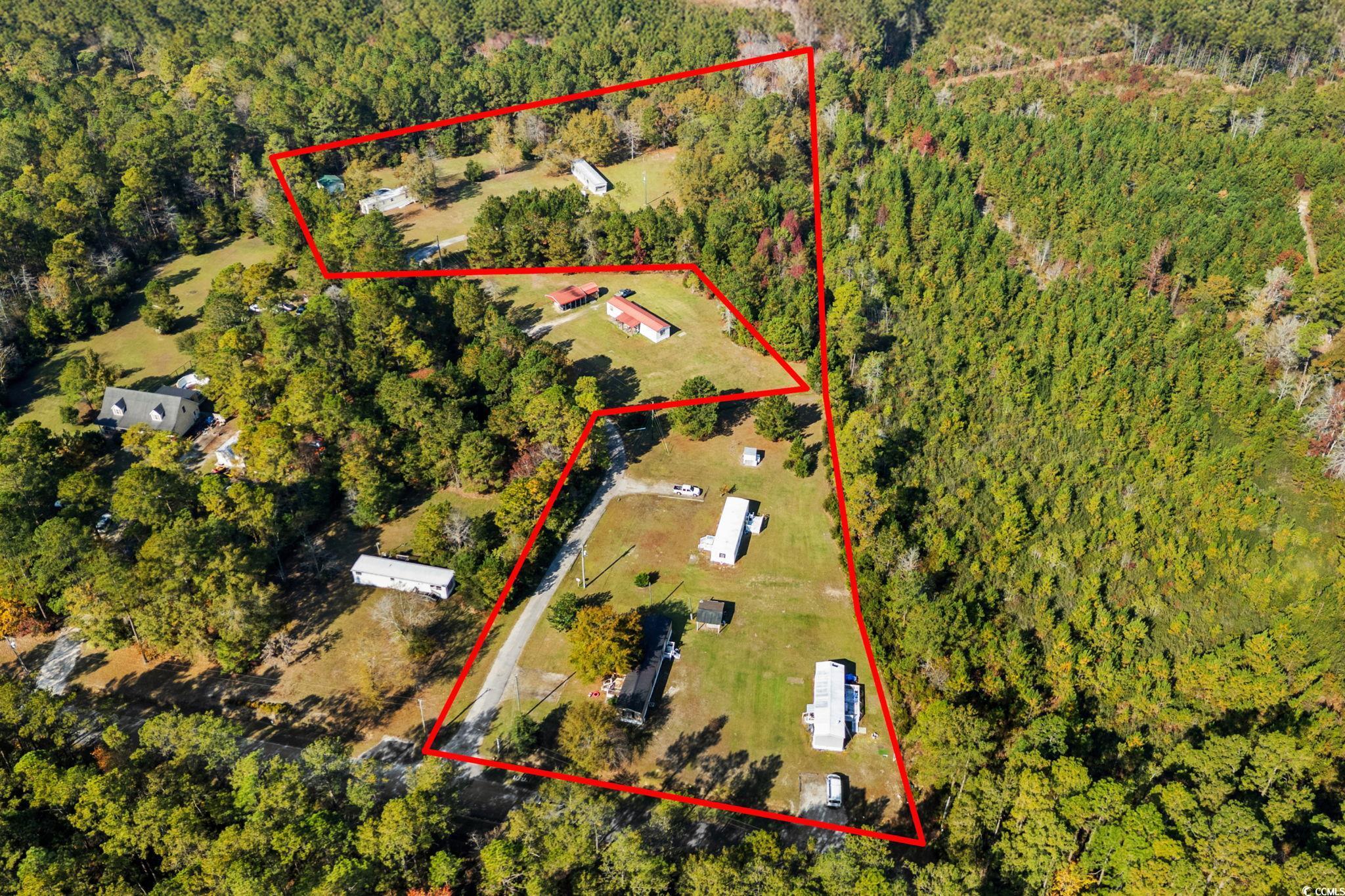 Currently featuring 5 Mobile homes, all occupied with tenants through March 31, 2026. The property offers ample space to add additional mobile homes. Zoned CFA and totaling approximately 5.98 acres. A survey is recommended to confirm boundary lines. All mobile homes are being sold as is.  Square footage is approximate and not guaranteed. Buyer is responsible for verification.