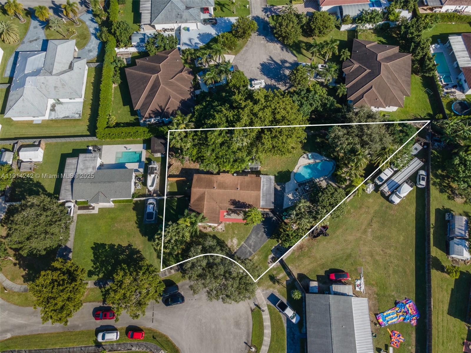 Spacious 4/3 on a 16,758 sqft lot offering privacy and endless possibilities. Home features a 2021 roof and partial impact windows/doors for added security. Beautiful pool updated in 2021 with new Diamond Brite and perimeter tiles, perfect for enjoying Florida living. One bathroom remodeled in 2023 with modern finishes. Large yard ideal for RV/boat parking, future expansions, or outdoor entertainment. No HOA, giving you the freedom to personalize your property. Located in a quiet and growing area of Homestead.