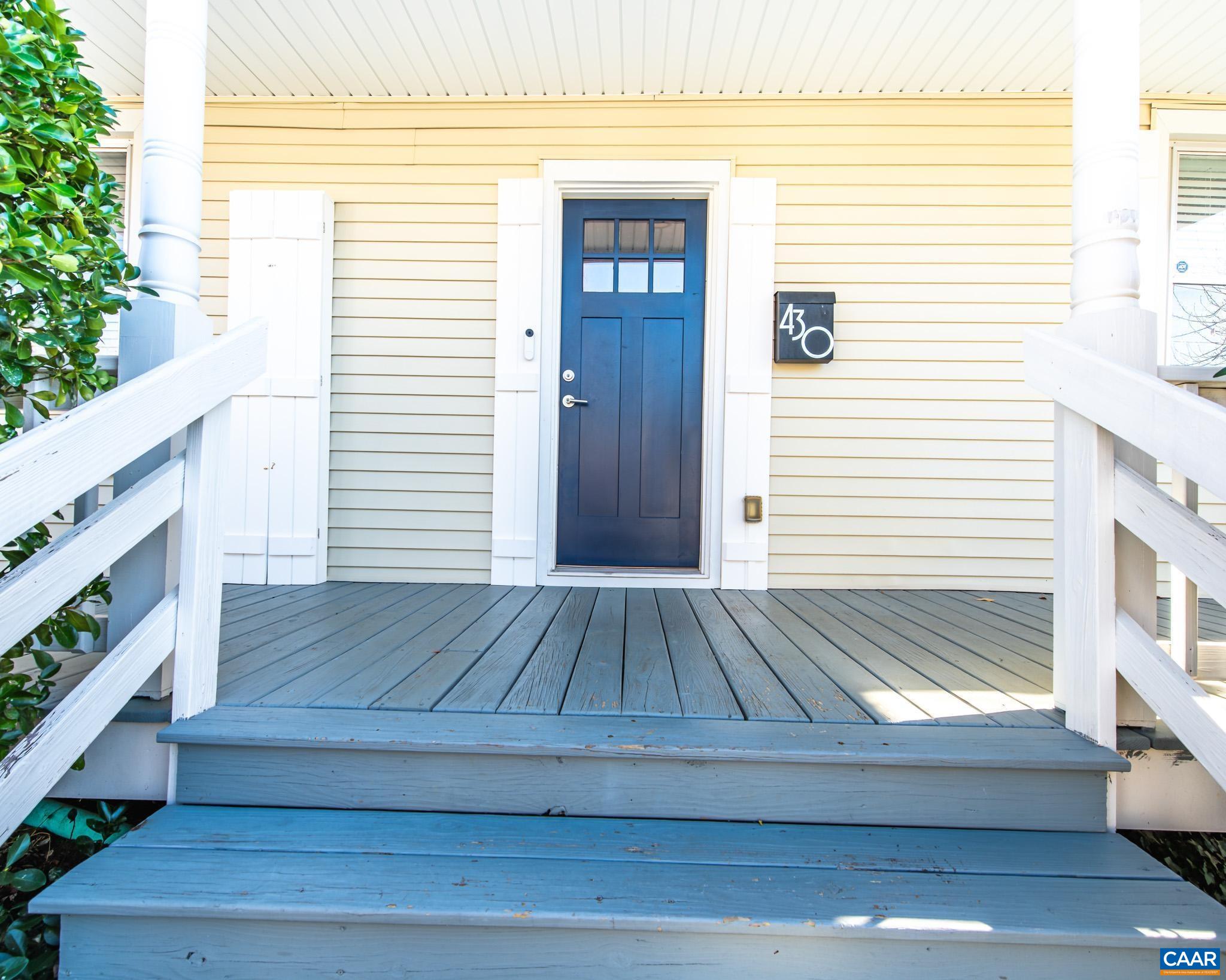 Bright and well-maintained home in the vibrant 10th & Page/West Street neighborhood offering exceptional access to UVA, the Downtown Mall, Dairy Market, parks, and bus lines. This corner-lot property includes alleyway access with off-street parking, a welcoming front porch, and mature landscaping that frames the home nicely. Inside, the freshly updated spaces highlight classic hardwood floors, wide room openings, and a practical built-in drop zone near the entry. The kitchen features modern cabinetry, granite counters, stainless appliances, subway-tile accents, abundant natural light, and a butcher-block work surface. The renovated full bath showcases a tile shower with glass enclosure, upgraded lighting, and a contemporary vanity. A dedicated laundry/mudroom adds convenience with storage and direct access to the rear of the property. This home provides a strong opportunity in a central Charlottesville neighborhood with room for future improvements and personal touches.