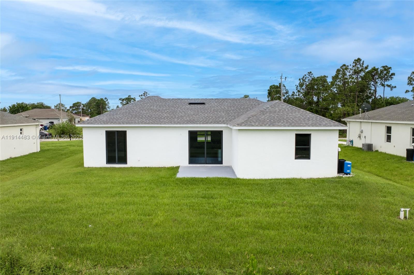 Open-concept living area at 933 GLEASON ST - Home in Lehigh Acres