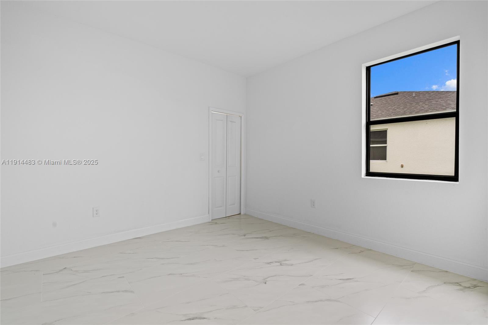Modern kitchen with designer features at 933 GLEASON ST - Home in Lehigh Acres