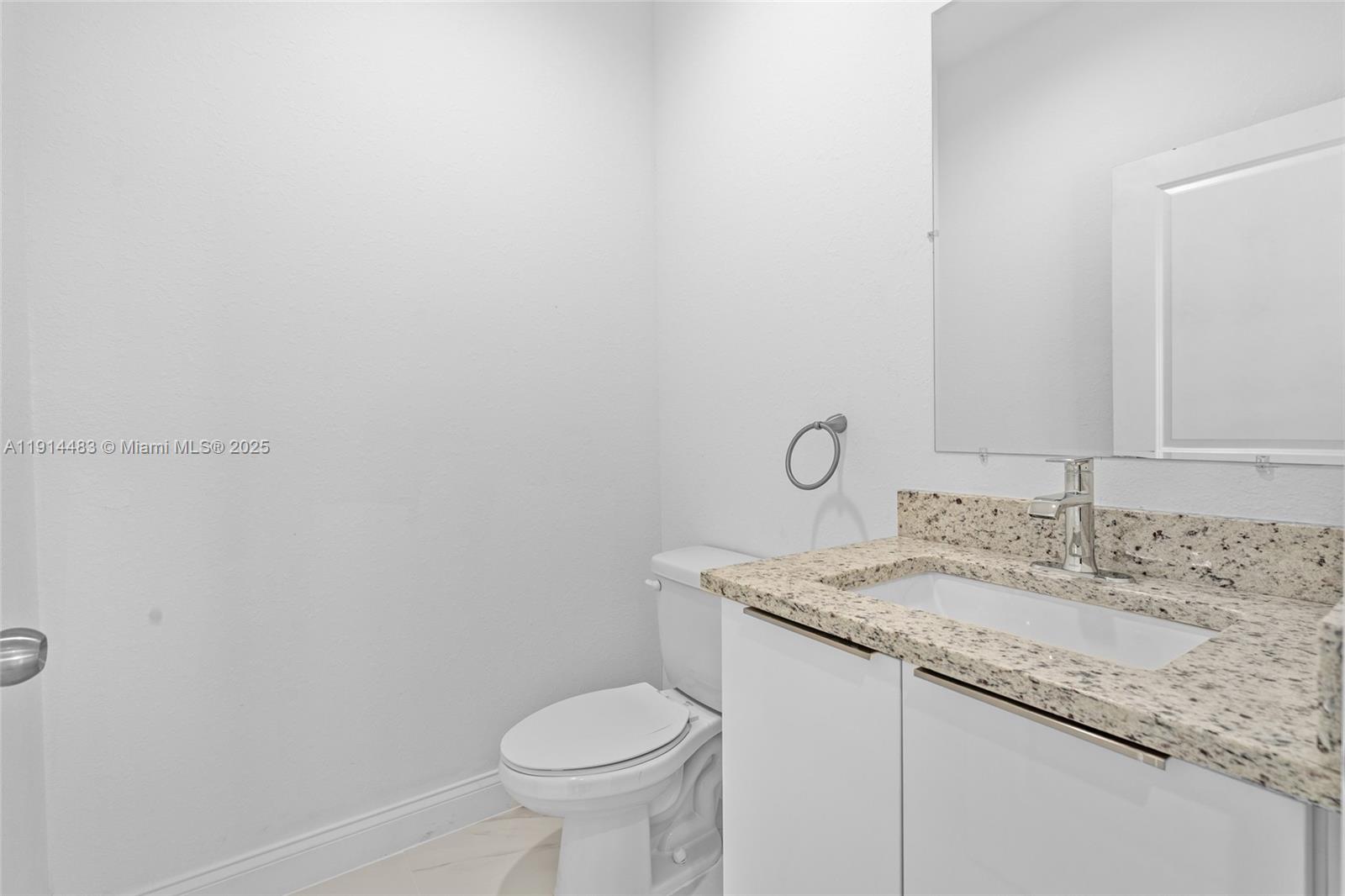 Designer master bathroom at 933 GLEASON ST - Home in Lehigh Acres