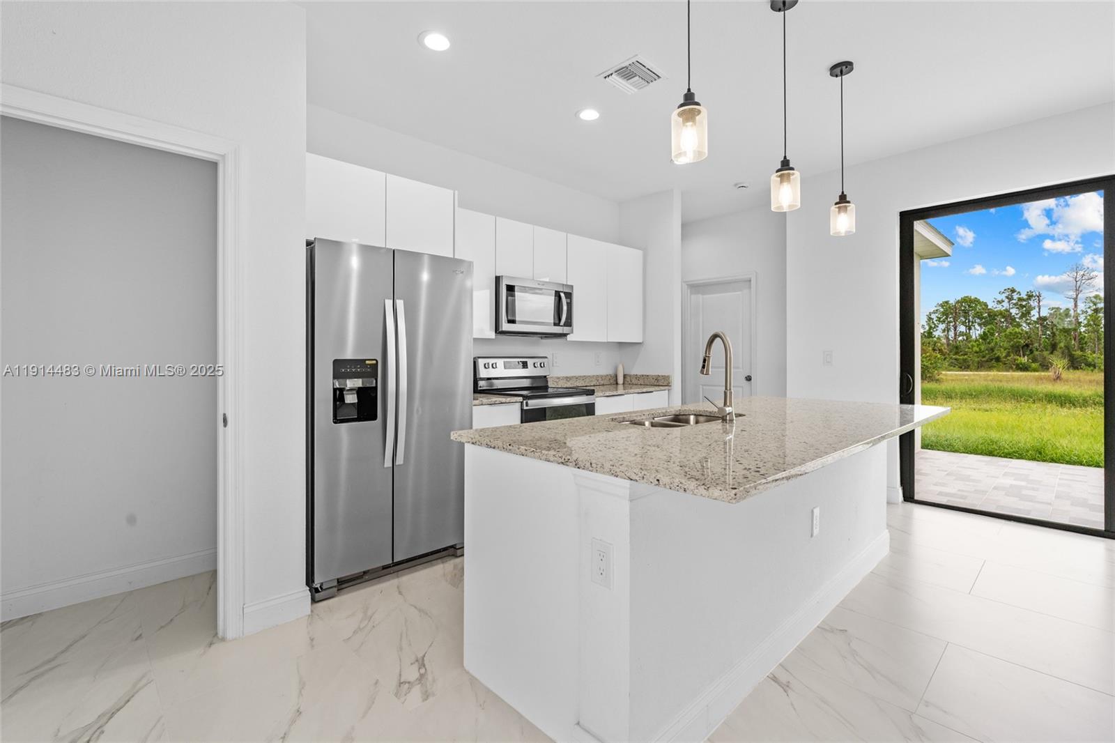 Elegant master bedroom retreat at 933 GLEASON ST - Home in Lehigh Acres