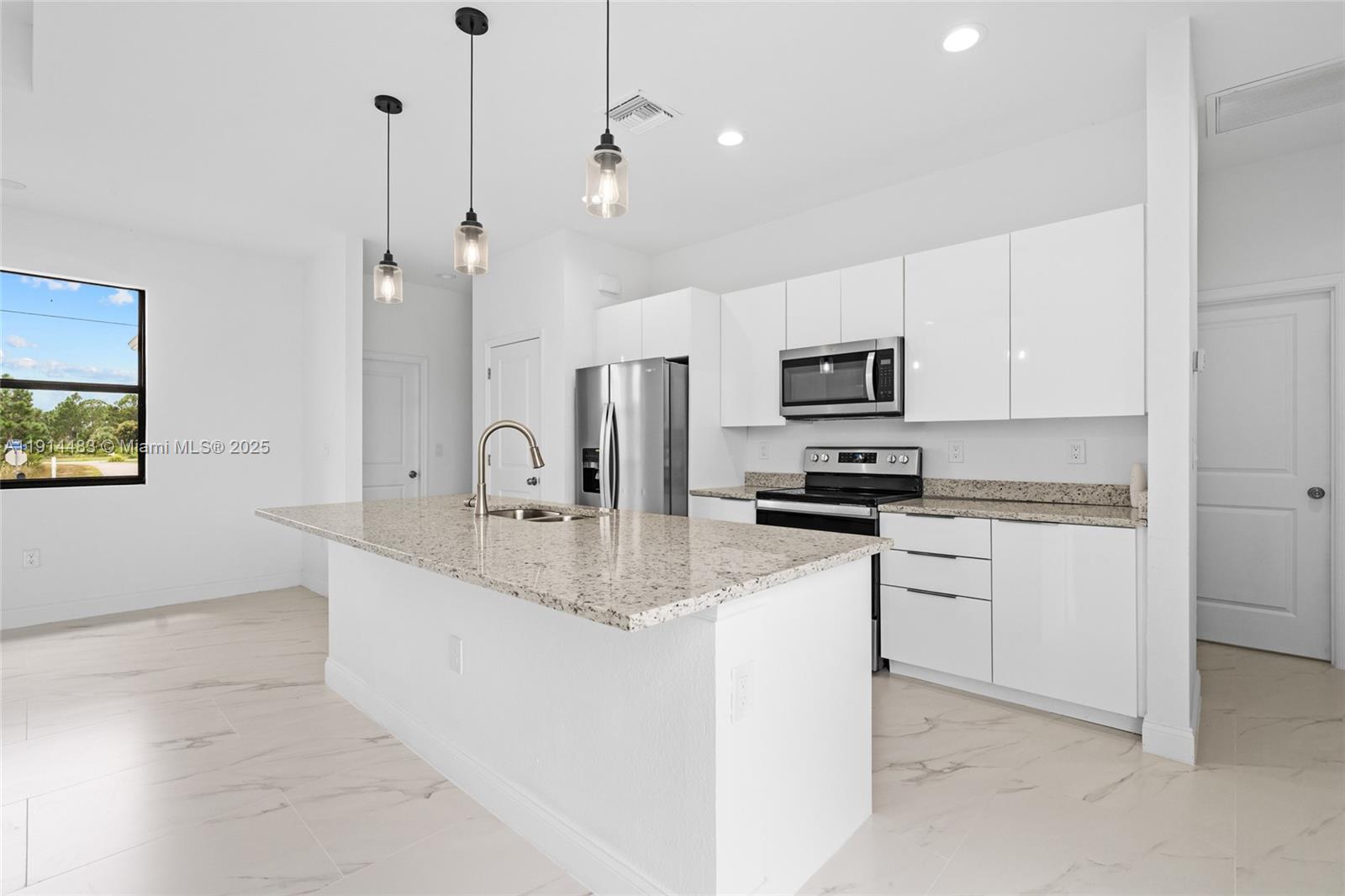 Designer master bathroom at 933 GLEASON ST - Home in Lehigh Acres