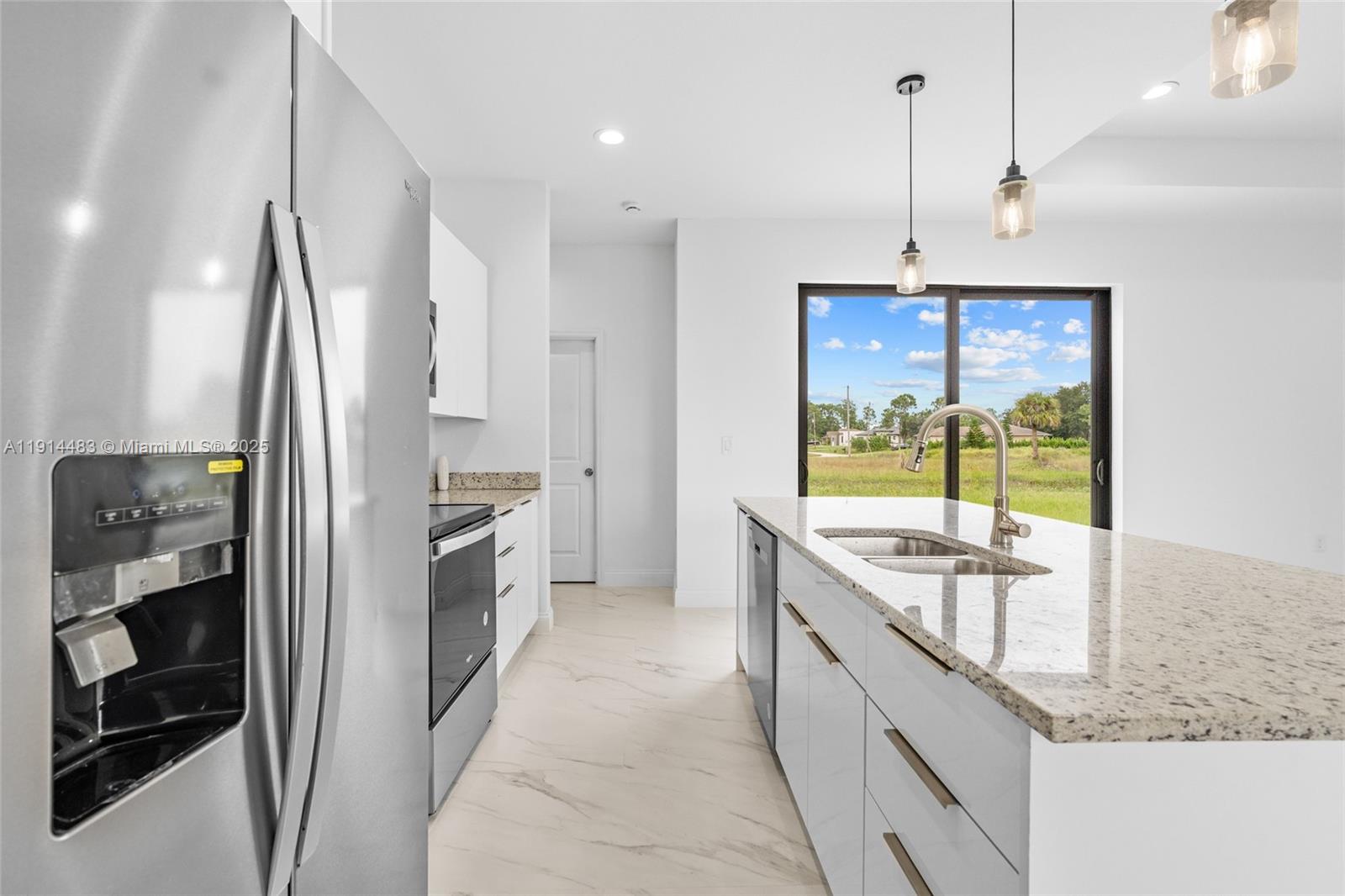 Spacious garage and storage at 933 GLEASON ST - Home in Lehigh Acres