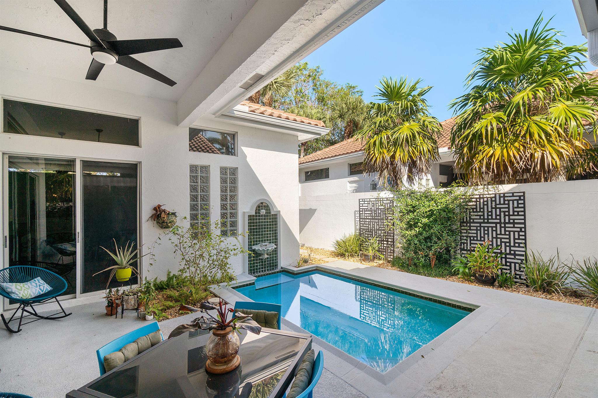 Absolute perfection! This beautifully maintained three-bedroom, three-bath, single-story townhome is located in the desirable Timbermill section of Broken Sound Country Club. Featuring tile flooring throughout, a split bedroom floor plan, and a light and bright interior, this home offers both comfort and privacy. Enjoy your own private courtyard with a small pool, perfect for relaxing or entertaining. The renovated kitchen includes an added pantry and extra storage in the laundry room. Additional highlights include a newer roof (2018) and air conditioner (2019). An easy walk to Calusa Elementary School. Experience complete privacy and the upscale lifestyle of Broken Sound's Platinum Club community.