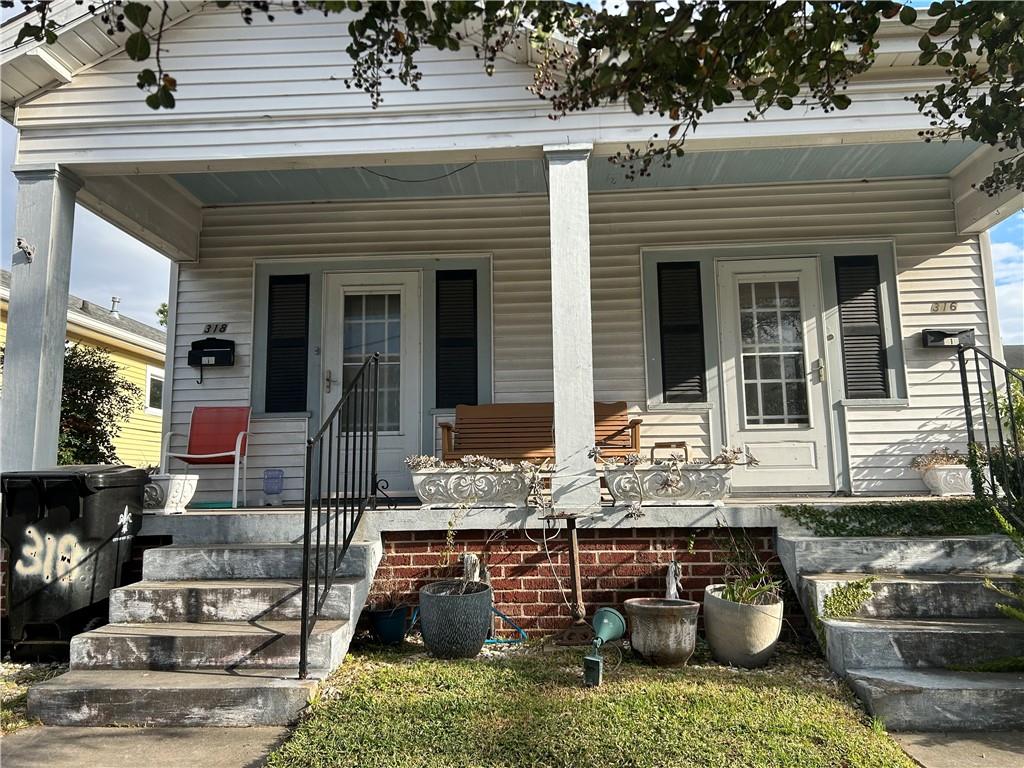 Welcome to the Heart of Mid-City.  This double has so much potential.  Convert back to 1 bedroom each or make it a single family home.  This property needs some attention but the possibilities are endless.  Quiet neighborhood within walking distance restaurants and bus stops.  Backyard is great for entertaining.  Shed in back has electricity for workshop as well as an electric awning.  Do not miss this opportunity to live in Mid-City or turn it into your investment property.  Call for a showing with your favorite agent.