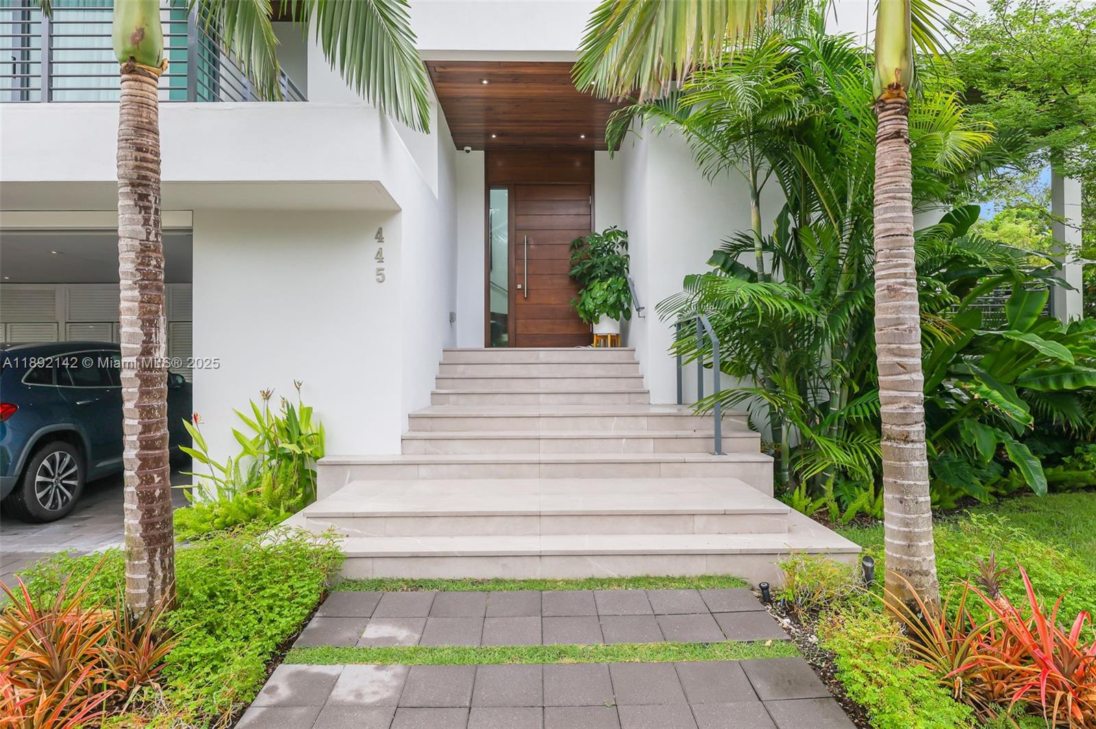 Contemporary home built in 2021 that offers modern design paired with tropical island living. Floor-to-ceiling windows that maximize natural light, clean architectural lines and high-end finishes • 5 bedrooms featuring ensuite baths, plus an additional powder room • A modern Italian kitchen equipped with Miele appliances • Spacious living room perfect for entertaining along with a fully equipped outdoor kitchen • Generous storage available inside the carport garage • A prime location in Key Biscayne, with convenient access to schools, beaches, restaurants, and community amenities.