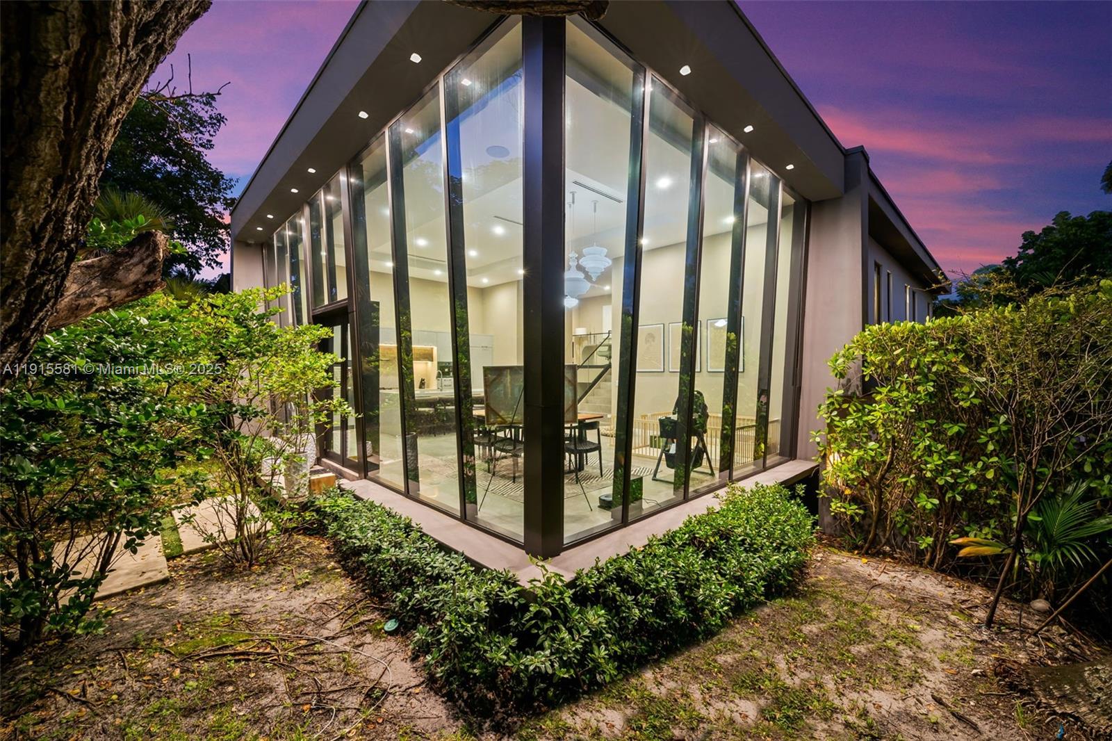 A rare opportunity to own a signature modern estate on sought-after Victoria Park Road. The “Glass House,” built in 2020 by award-winning Edewaard Development, showcases high-end finishes and striking architectural design. Its dramatic, soaring entry sets the tone for this lushly landscaped residence on the historic Ridge. The home offers expansive living spaces, 4 bedrooms, 4.5 baths, a gourmet Miele kitchen with built-in espresso machine, family room, loft, and a tropical oasis backyard with heated pool, patio, covered porch with motorized phantom screen, and a coveted summer kitchen. Minutes to Las Olas, downtown dining, boutiques, and pristine beaches. Enjoy nearby parks and cafés in a lifestyle both vibrant and serene. A must-see home.