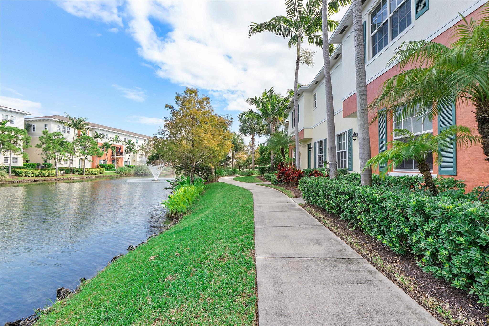 Beautifully updated 3BD/2.5BA two-story townhome in the desirable Orchid Grove community of Pompano Beach. This bright residence features full impact windows and doors, tile flooring throughout the main level, and a spacious open layout combining the kitchen, dining, and family room—perfect for entertaining. The kitchen includes new appliances and overlooks serene lake views with the relaxing sound of the community fountain. Upstairs offers two generous guest bedrooms and a massive primary suite with two walk-in closets, a soaking tub, and a separate shower. Low HOA dues and resort-style amenities include a full fitness center, an oversized lakeside pool, clubhouse, and walking paths. Ideally located 10 minutes to the beach, shops, dining, and everything Pompano Beach has to offer.