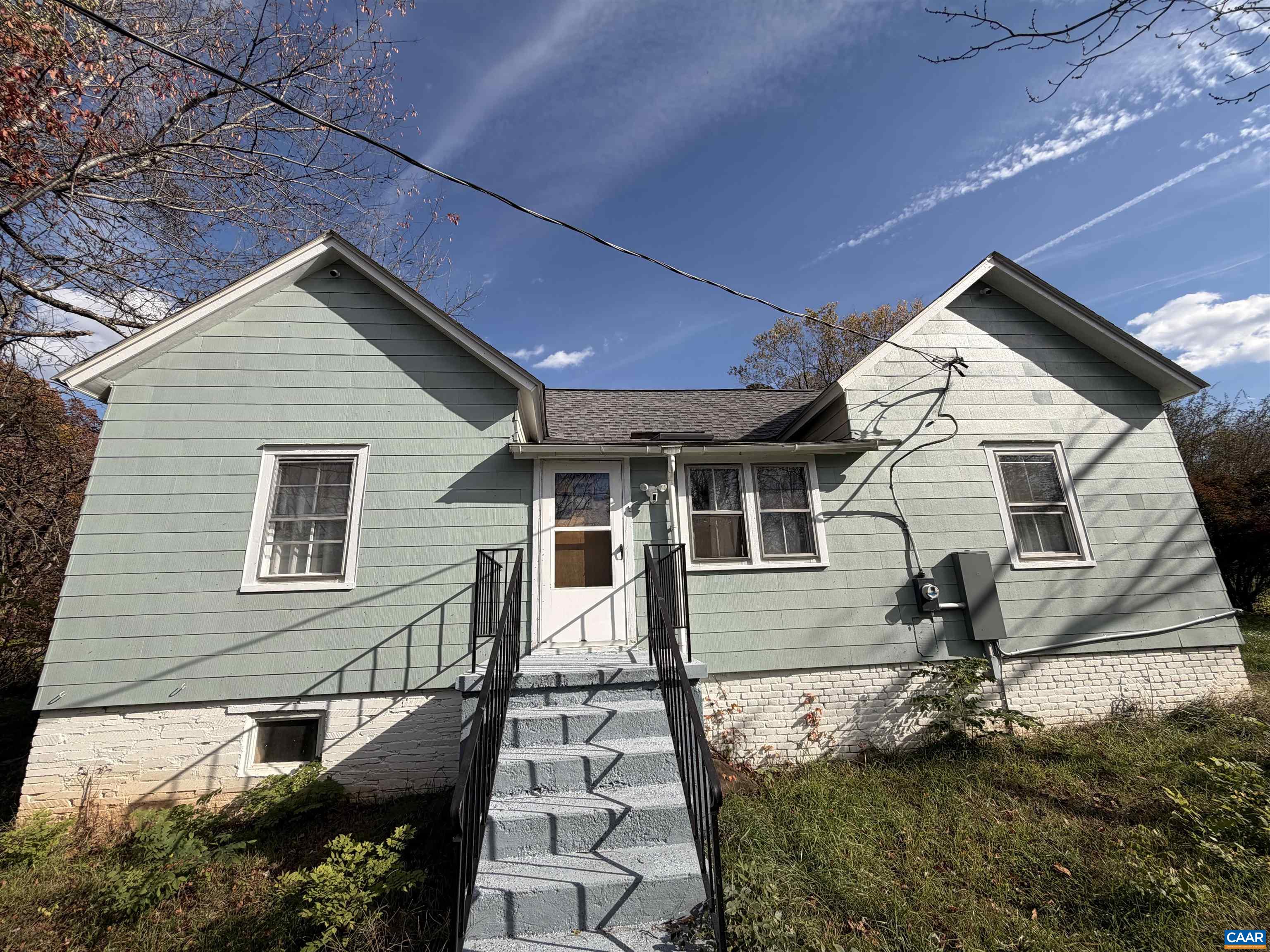 Welcome to 7559 Esmont Rd, a beautifully renovated home that offers the perfect blend of modern updates and country charm. Just 25 minutes from Charlottesville and 10 minutes from Scottsville, this move-in-ready property offers a perfect blend of rural peace and convenient access to shopping, dining, and schools.  The home has been completely renovated from top to bottom. Upgrades include a brand-new kitchen, stylish bathroom, new HVAC system, updated plumbing and electrical systems, fresh paint throughout,  a new septic system and a new roof—ensuring years of worry-free living. Roof and the washer dryer are under warranty.  Inside, you’ll find bright and open spaces designed for comfort and functionality. Whether enjoying quiet evenings at home or hosting family and friends, this home offers the perfect setting.  With its ideal location and extensive updates, 7559 Esmont Rd presents a rare opportunity to own a modernized home in a classic country setting.