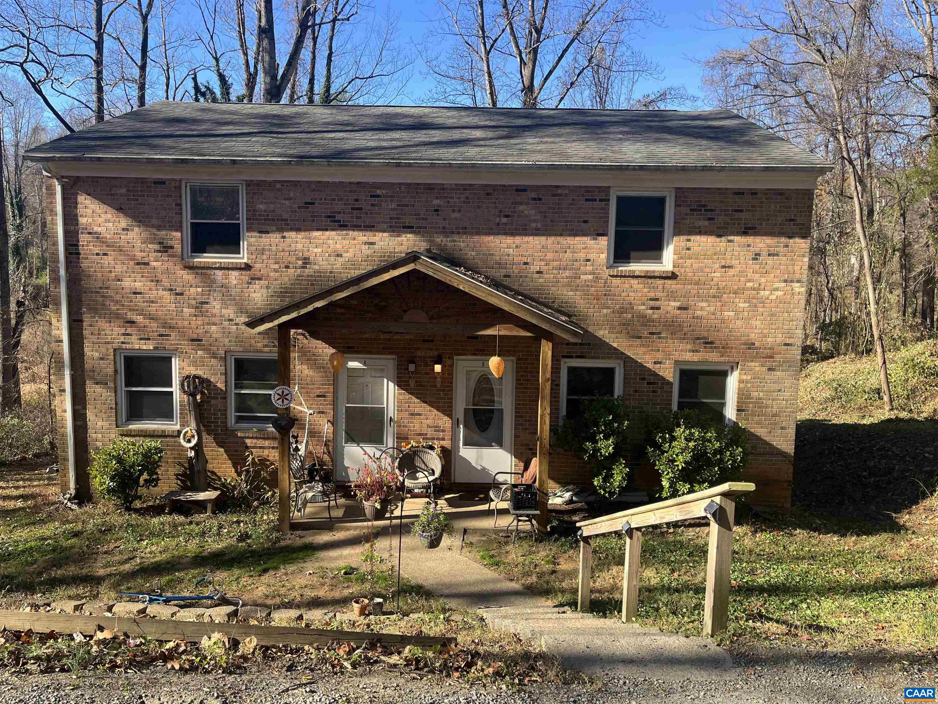 This solid and spacious duplex is tucked into a quiet neighborhood, offering an ideal blend of privacy and convenience. Each apartment features 3 bedrooms and 3 bathrooms, providing generous living space and strong rental appeal. Enjoy solid hardwood and tile flooring throughout—no carpet anywhere! A large rear deck overlooks a natural wetland, creating a peaceful outdoor retreat. Recent updates include new windows and an efficient mini-split system, adding comfort and energy savings. Both units are currently occupied by long-term, happy tenants, making this a fantastic turnkey investment opportunity. The property is close to UVA, shopping, dining, and has easy access to the highway—an ideal location for steady rental demand.