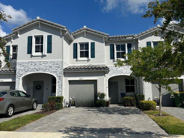 The community of Riviera Rio in Homestead, has a spacious Townhouse that features, tile flooring through first floor, carpet throughout second floor, open kitchen concept with stainless steel appliances and granite countertops, an in-unit washer/dryer, spacious yard and 1-car garage with automatic door opener. Situated less than a mile from shopping centers, restaurants and major highways. *** TENANT OCCUPIED TILL December 2025 ***
