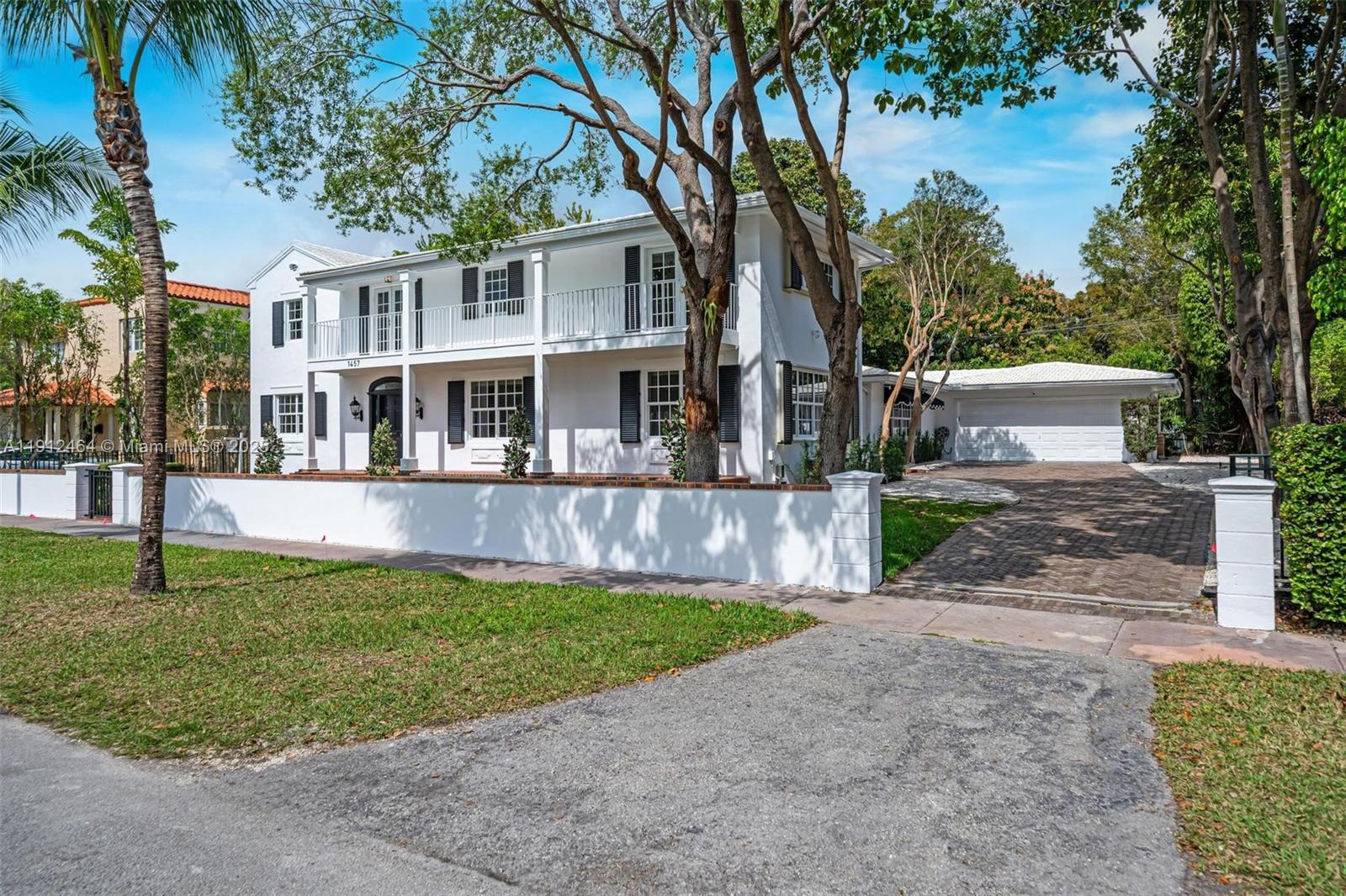 Explore this Coral Gables home on a double lot which blends classic architecture with modern design! This tastefully updated residence boasts 4 bedrooms, 3.5 bathrooms, & a detached 1/1 guesthouse w/ kitchen. Upon entry, prepare to be greeted by incredible natural light & an open spacious floor plan. The light & bright gourmet kitchen features quartz countertops and seamlessly flows to the formal dining room. The oversized primary suite features terrace access & a luxurious bathroom with dual sinks & beautiful stonework. The additional bedrooms are generously sized. Out back, find an entertaining deck and detached garage with workshop. Located in one of the most desired pockets of Coral Gables, live in close proximity to Downtown Coral Gables, Riviera Country Club, Coconut Grove, & more!