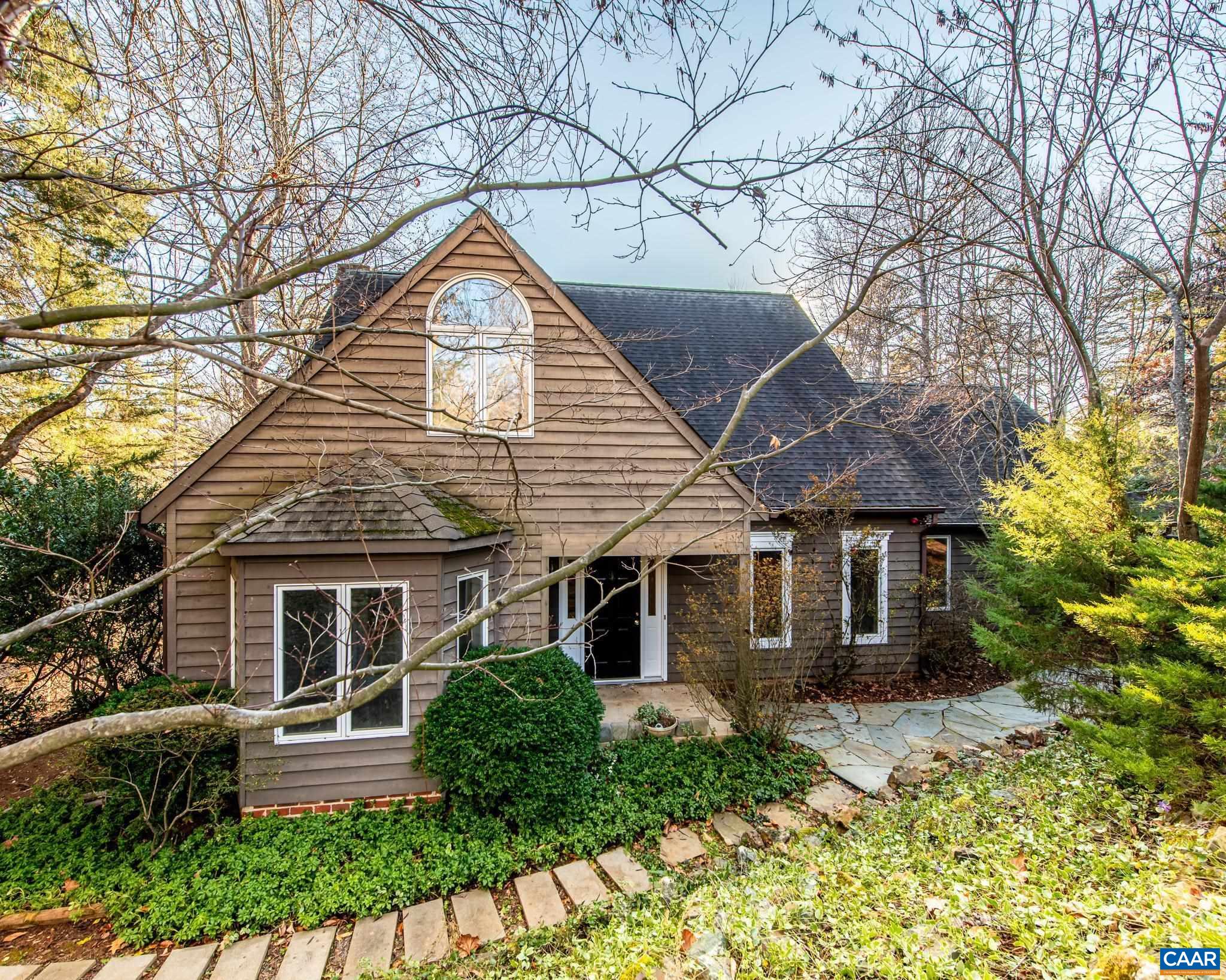 Set on a more private, tree-framed lot at the end of a cul-de-sac, this Mill Creek home offers one of the neighborhood’s larger floor plans with over 2,000 finished square feet, a two-car garage, and shed. Major recent updates include a 2023 HVAC, 2022 hot water heater, 7-year-old roof, and a new skylight, all providing long-term value while leaving room for your improvements that suit your personal taste. Several rooms have been freshly painted for a bright, refreshed feel. The light-filled family room features a fireplace and large windows overlooking the woods and flows openly to the kitchen and out spacious deck. Formal dining and living rooms and office/library offer flexible space for work. Upstairs, the primary suite includes a jetted tub framed by an arch-top window, creating a relaxing retreat and two other bedrooms and a bathroom. The low-maintenance yard blends naturally with the landscape, offering privacy and a sense of escape—just minutes to Downtown, UVA, I-64, shopping, and schools.'