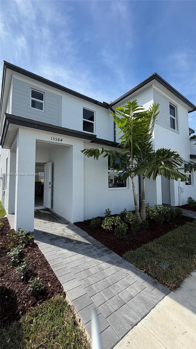 Be the first to live in this brand-new, beautiful townhome in the Vivint Promenade community. This spacious, open-concept two-story home features a modern kitchen with a large counter, abundant natural light, and generous living areas. It offers three bedrooms and three full baths, including a convenient one-bedroom and full bath on the first floor. Enjoy the paved, fenced backyard—perfect for outdoor living—and the convenience of an in-unit washer and dryer. Community amenities include a children’s play area and a pool. Ideally located near the Florida Turnpike, with easy access to the Florida Keys, restaurants, and shops. Move-in ready and easy to show!