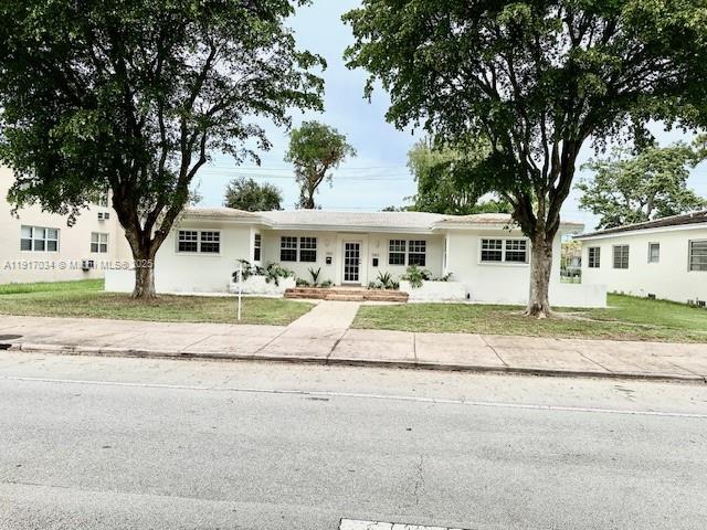 Beautifully remodeled spacious efficiency - 600SF - Separate building in back of a duplex - New kitchen, bathroom, floors, impact windows and doors, A/C, insulation, blinds - 1 free parking + street parking with permit - landlord pays electricity, water and waste.