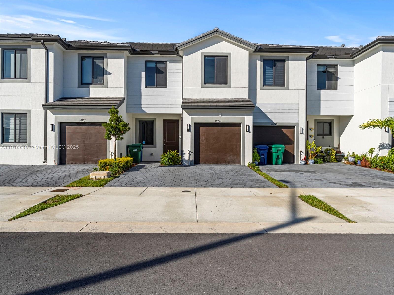 Newly built townhomes, 3 bedrooms, 2 1/2 bathrooms. One car garage.**Impact Windows** A modern open-concept kitchen with quartz countertops. Open living and dining areas perfect for entertaining. Energy-efficient appliances, hurricane-proof windows and doors, tiled floor on first floor and laminate on second floor. Built with 100% concrete in between floors. Ideal opportunity for buyers seeking comfort and convenience.