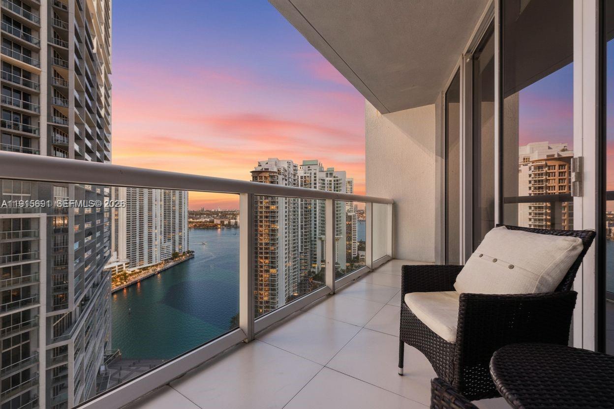 Welcome to your new lap of luxury lifestyle!! Stunning city and bay views from this 1-bedroom residence featuring soaring 20 foot double-height ceilings and modern finishes. The kitchen offers Italian cabinetry, Sub-Zero refrigerator, Bosch appliances, and a dishwasher. Enjoy world-class amenities including an Olympic-sized pool, rooftop bar, theater room, luxury spa, Equinox-style fitness center, and 24-hour concierge. Icon is renowned for its zc5-star resort amenities and prime Brickell location—easy access to I-95 and Downtown, and home to two elite restaurants. Just a short walk to Brickell City Centre, Whole Foods, shopping, and endless entertainment. The community features the largest residential condo pool in the area, offering a true resort-style oasis. No special assessments. No Airbnb allowed. Low HOA. Please ask us about the 3-2-1 approved lender buydown. Meaning you get an interest rate as low as 3% with a monthly payment probably lower that what you're paying in rent!! Unpack & enjoy...On Zillow, scroll down to "facts & features", click on "show more", then click "View virtual tour" for your Virtual Interactive Lifestyle Concierge! Ask anything. Explore everything.