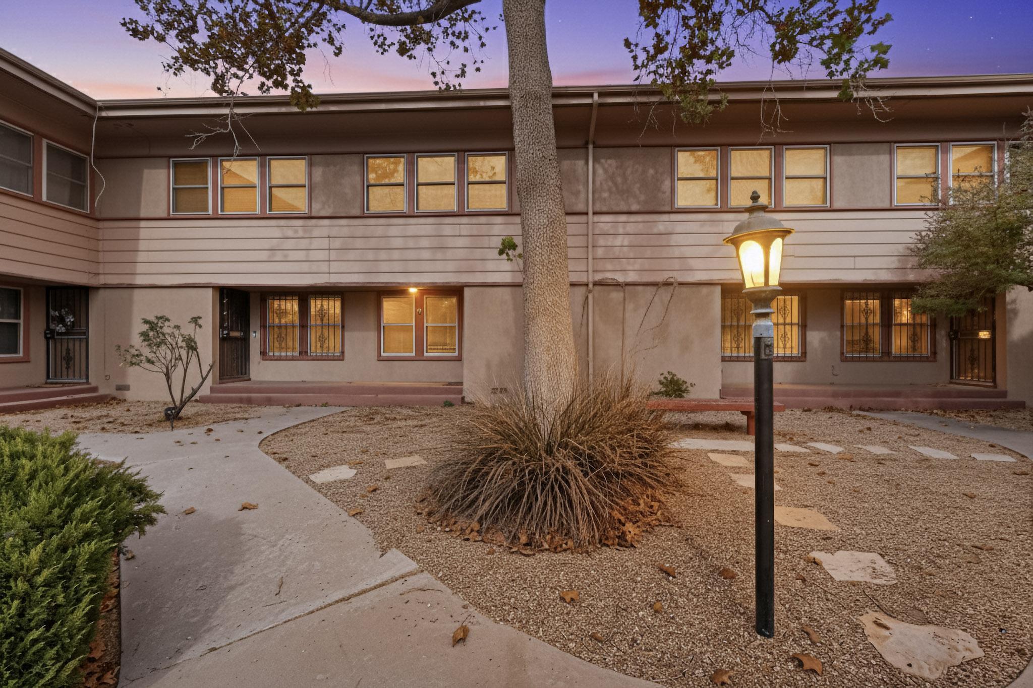 This is your chance to ''get on the bus'' to homeownership--and this home qualifies for a $17,500 grant to help you close with little to no money out of pocket. It's not a government program and never has to be repaid; call for qualifying details! This charming 2-bedroom, 1-bathroom townhouse is just minutes from downtown shops and dining. It features inviting wood siding, warm wood and tile floors, and a bright, functional layout. A designated carport and private storage area add convenience. Enjoy low-maintenance living in a prime, accessible location.