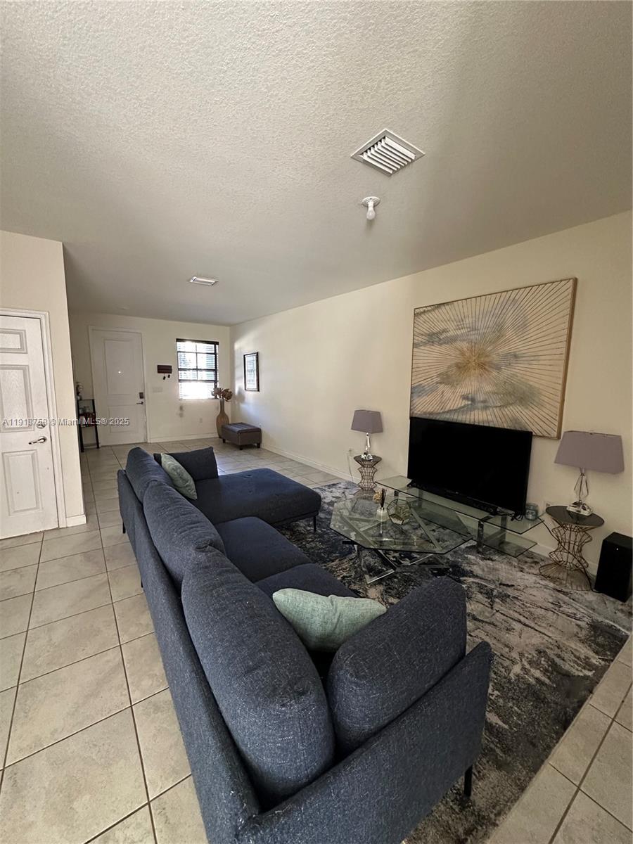 Beautiful and spacious 3-bedroom, 2.5-bathroom furnished townhouse with attached garage! This well-maintained home features new vinyl flooring on the second floor and stairs, adding a fresh and modern touch. Enjoy peace of mind with security cameras installed both indoors and outdoors. Comfortable layout, ideal for families or professionals. Just move in and start living!