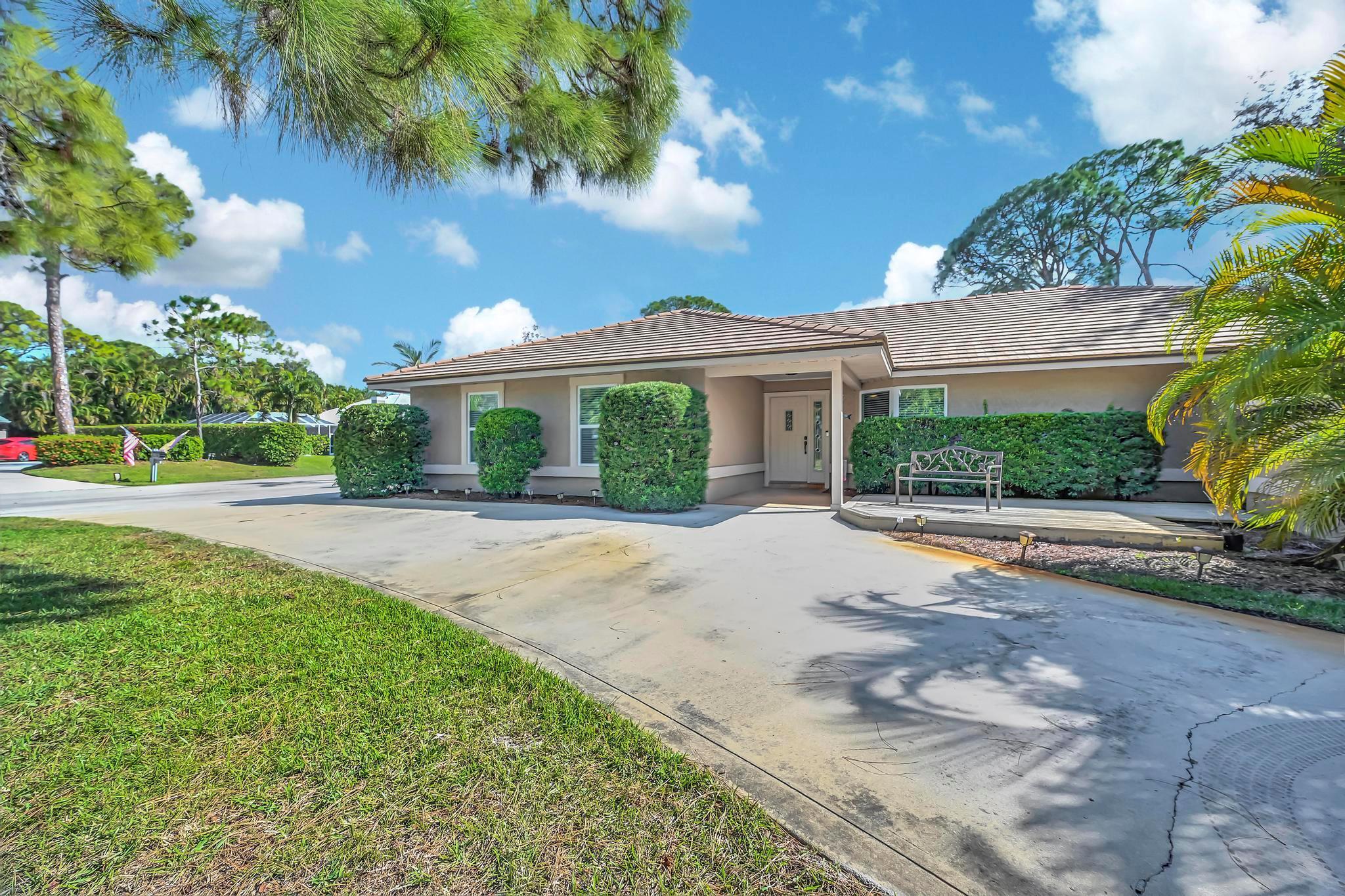 Rare opportunity! Own a stunning 3 bed 2 bath pool home on a spacious 0.4+ acre corner lot in the exclusive, gated, River Landing community in Palm City. This home has been meticulously cared for. Enjoy a private boat storage area, a community boat ramp with direct ocean access, and tennis courts for an active lifestyle--perfect for boating and sports enthusiasts! Recent updates shine throughout, including a luxurious master bath, recently painted interior and exterior, newer appliances, updated impact windows for added safety and energy efficiency, and beautifully landscaped. Ideally located near both I-95 and Florida's Turnpike for easy commuting. Live the Florida lifestyle you've always dreamed of--this is the one you've been waiting for.