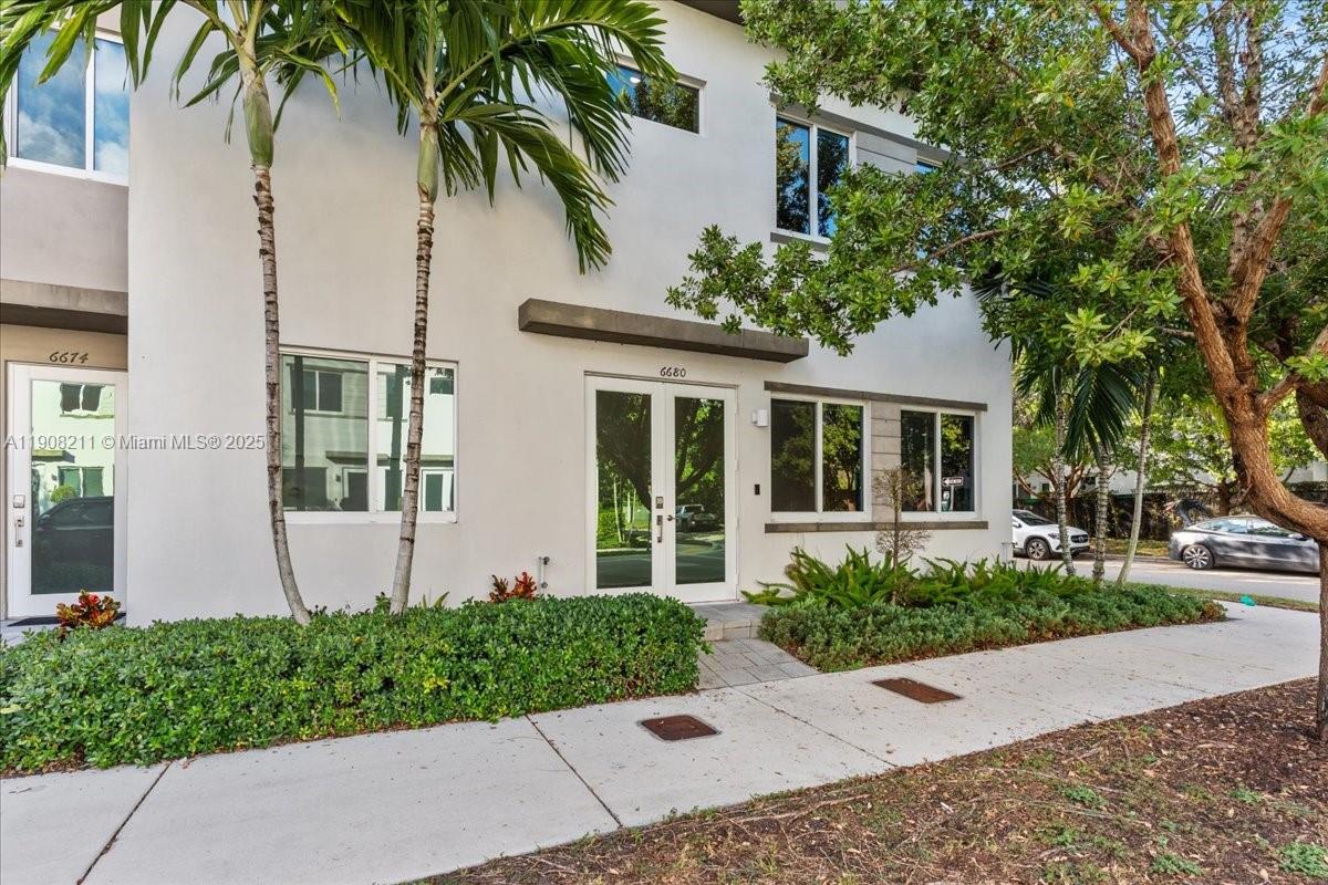 Excellent Investment Opportunity in Landmark Doral!Discover this stunning and highly upgraded 4-bedroom, 3.5-bath townhouse located in one of Doral’s most sought-after communities. This home offers a perfect blend of style, comfort, and functionality.Step inside to find high-end tile flooring, modern designer lighting, and beautifully upgraded finishes throughout the first level. The spacious kitchen and living areas flow seamlessly to a custom patio featuring a built-in Brazilian BBQ—ideal for entertaining and outdoor dining.The second level showcases sleek vinyl flooring and impact-resistant windows for added safety and efficiency. A standout feature of this property is the 4th bedroom with a private entrance and a convenient kitchenette, making it perfect for in-laws, guests, or rental income.Located in the prestigious Landmark Doral community, residents enjoy resort-style amenities including a luxurious clubhouse, sparkling pool, water park, state-of-the-art gym, tennis courts, community room for events, and picnic areas—offering a truly complete lifestyle.Don’t miss this exceptional opportunity to own a beautifully upgraded home in a prime location!