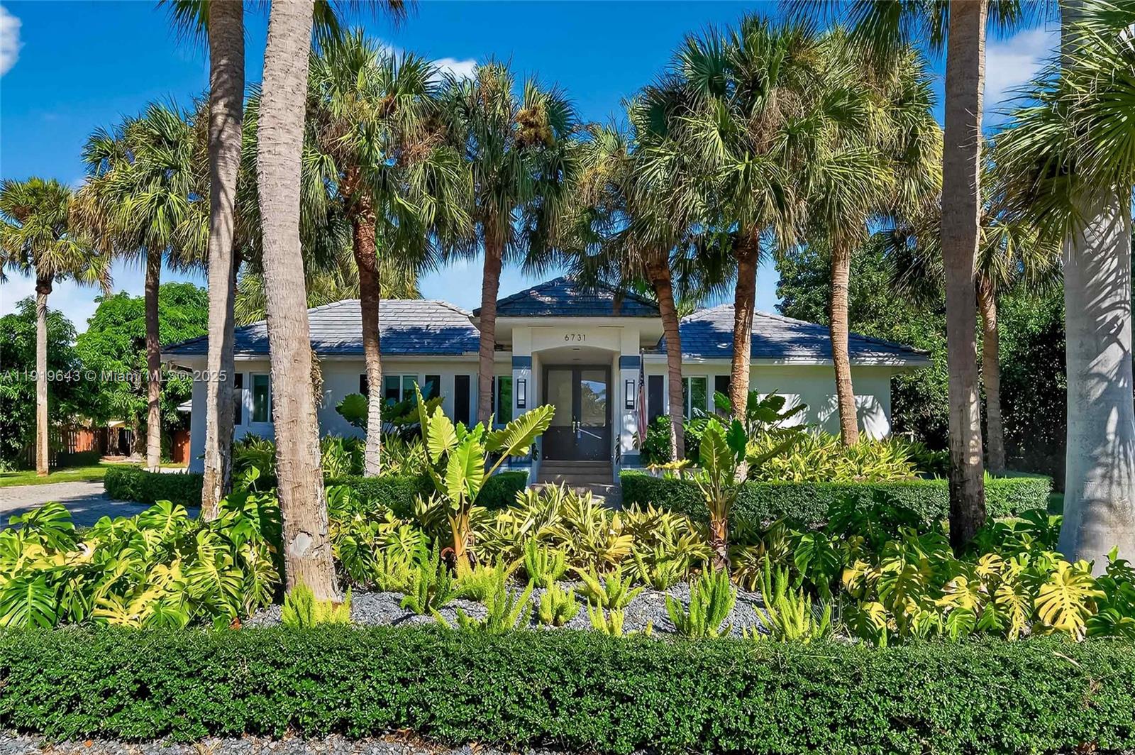 Welcome to your dream home in Old Cutler Groves! This stunning single-family home boasts 4 bedrooms, 4 bathrooms, a 2-car garage, and an in-ground pool perfect for entertaining friends and family. The spacious office area provides the ideal space for working from home, while the ample driveway and guest house offer plenty of room for visitors. Step inside and be greeted by luxurious marble and wood floors and a custom-made kitchen that will inspire your inner chef. The impact windows and doors provide peace of mind during storm season, while the tropical lush surroundings create a serene oasis right in your backyard. Enjoy the privacy of the private roads and take advantage of the on-site tennis courts for a friendly match with neighbors. This home truly has it all, combining elegance and functionality in a desirable location.