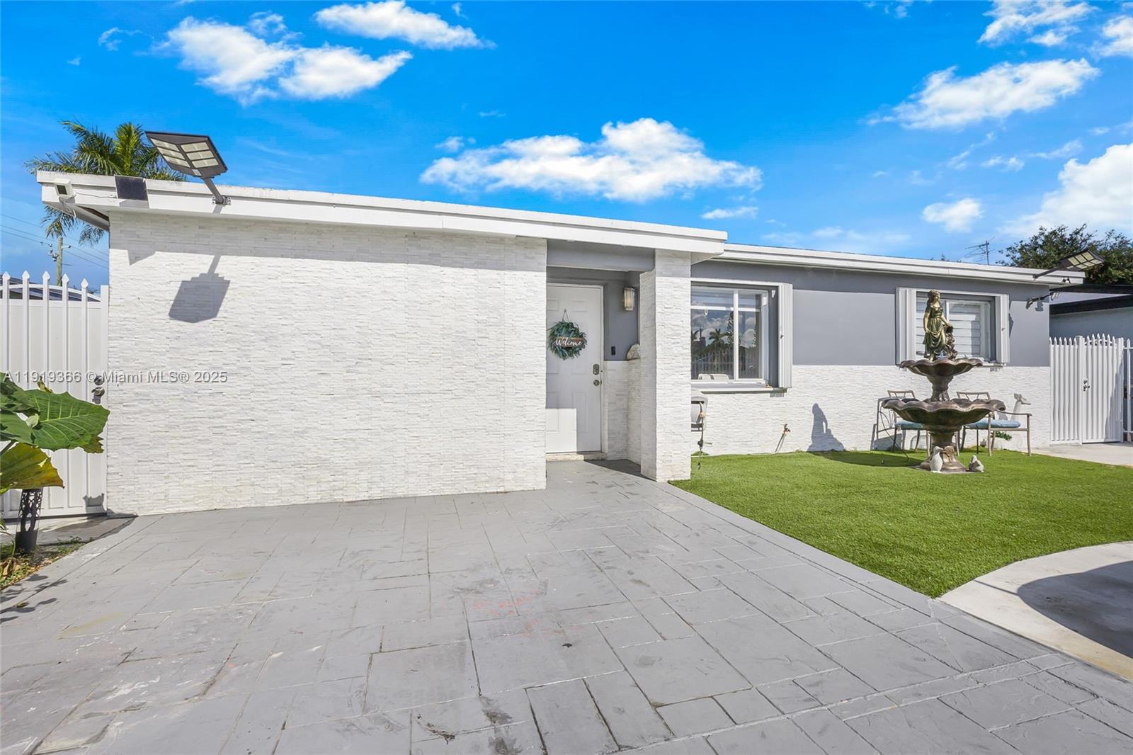 Beautiful 3-bedroom, 2 bathroom home in Homestead featuring a bright open floor plan, modern flooring, recessed lighting, and an updated kitchen with white cabinetry, quartz counters, stainless steel appliances, and plenty of storage. Stylish bathrooms and an indoor laundry area add convenience. The backyard is an entertainer’s dream with a spacious covered outdoor kitchen, bar area, TV setup, and low-maintenance turf. Property offers gated parking with room for RVs, boats, or work trailers. Includes an on-site RV for extra space or storage. Move-in ready and located near schools, shopping, and major highways.