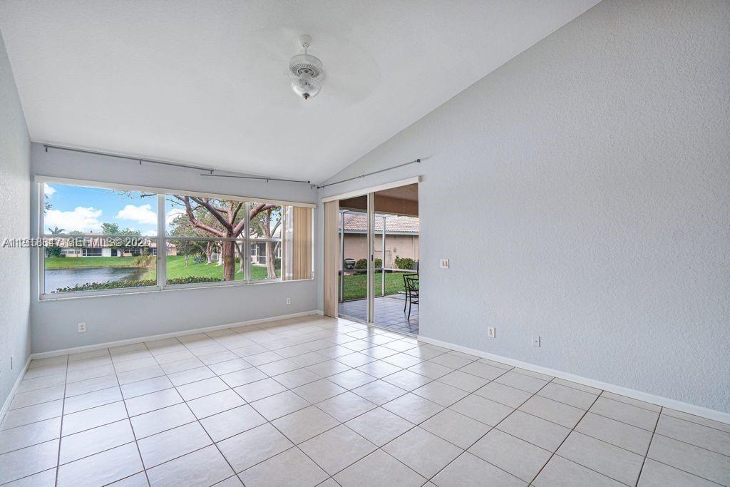Stunning waterfront exterior at 2437 Coral Trace Cir - Townhouse in Delray Beach