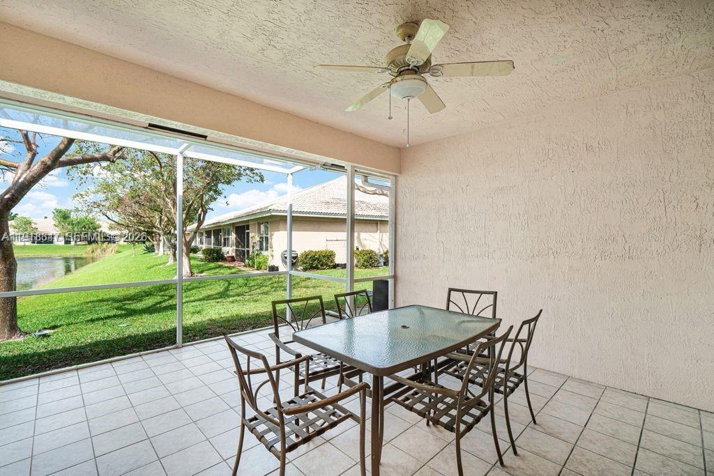 Elegant master bedroom retreat at 2437 Coral Trace Cir - Townhouse in Delray Beach